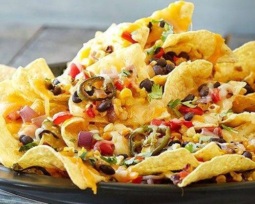Order Chicken Loaded Nachos food online from Istanbul Café store, New Orleans on bringmethat.com