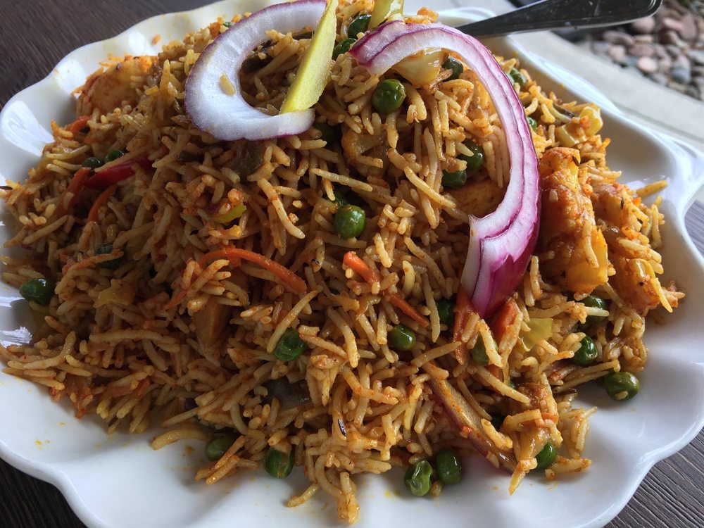 Order  Peas Pulao Rice food online from Himalayan Restaurant store, San Diego on bringmethat.com
