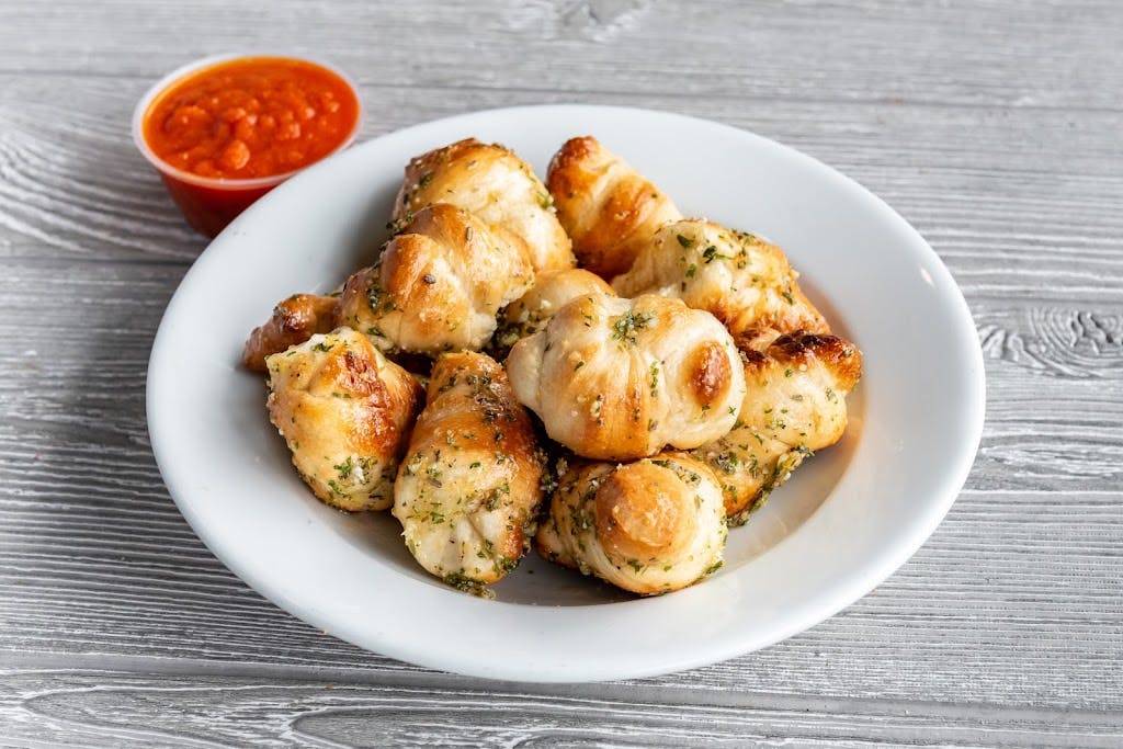 Order Garlic Knots - 6 Pieces food online from Pronto Pizza store, Merchantville on bringmethat.com