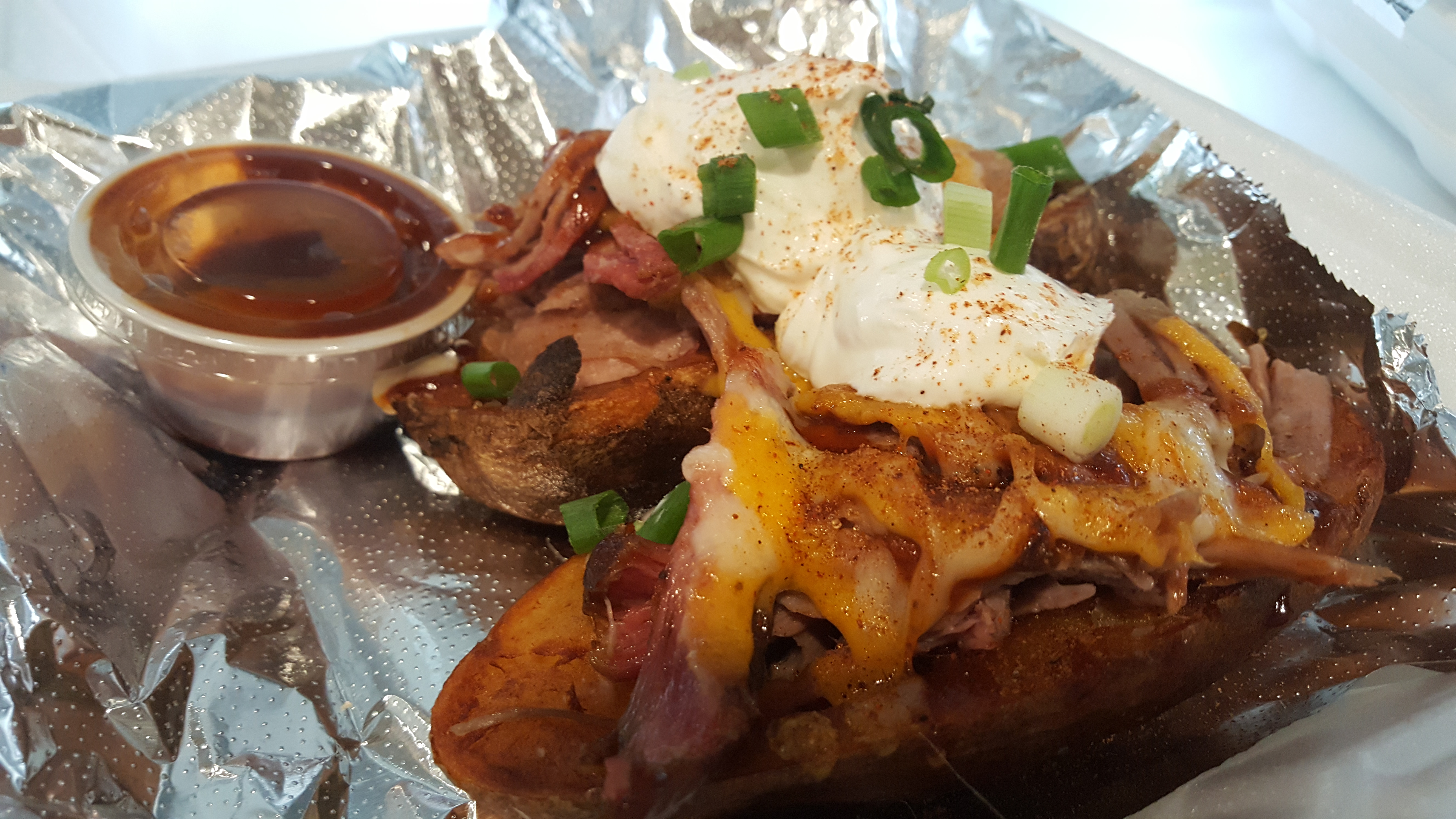 Order Stuffed Potato Skin food online from Bodacious Pig Barbecue store, Eagle on bringmethat.com