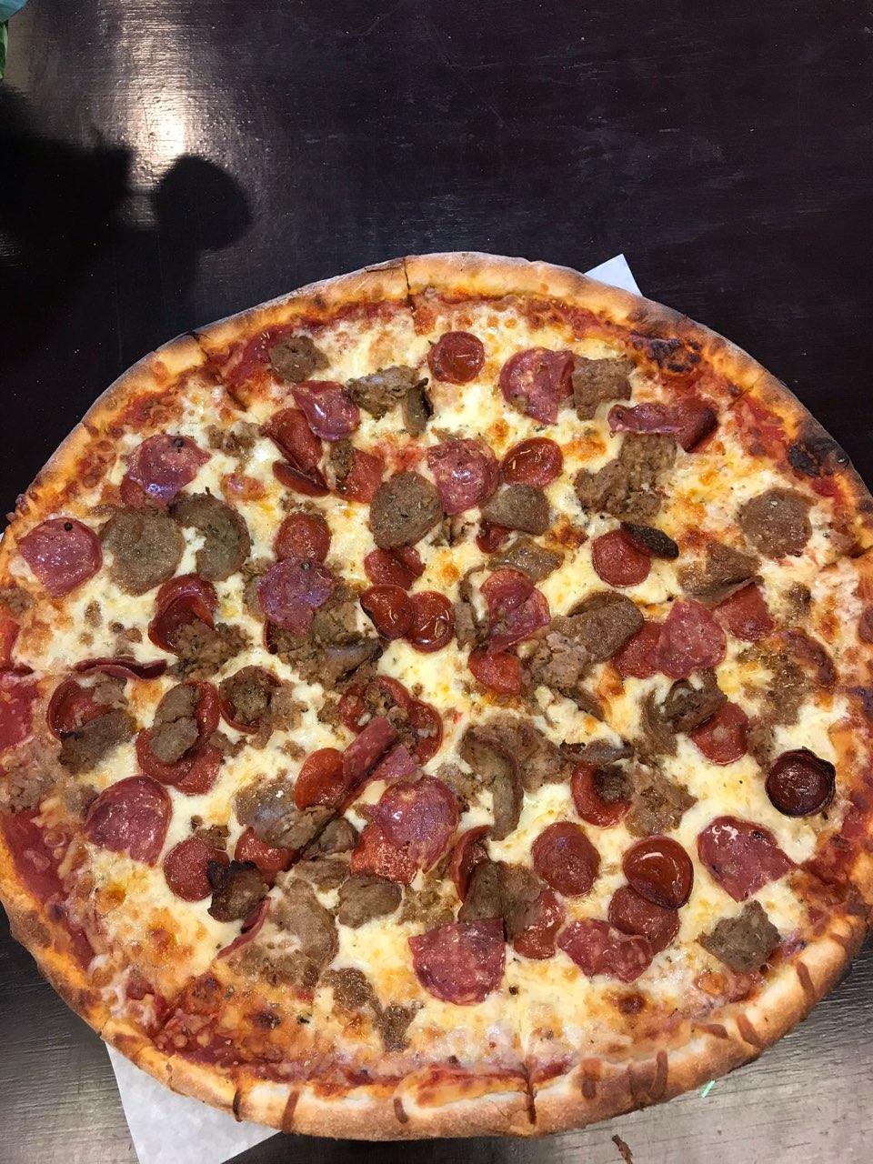 Order Clemenza Pizza food online from Capos Pizza store, San Antonio on bringmethat.com