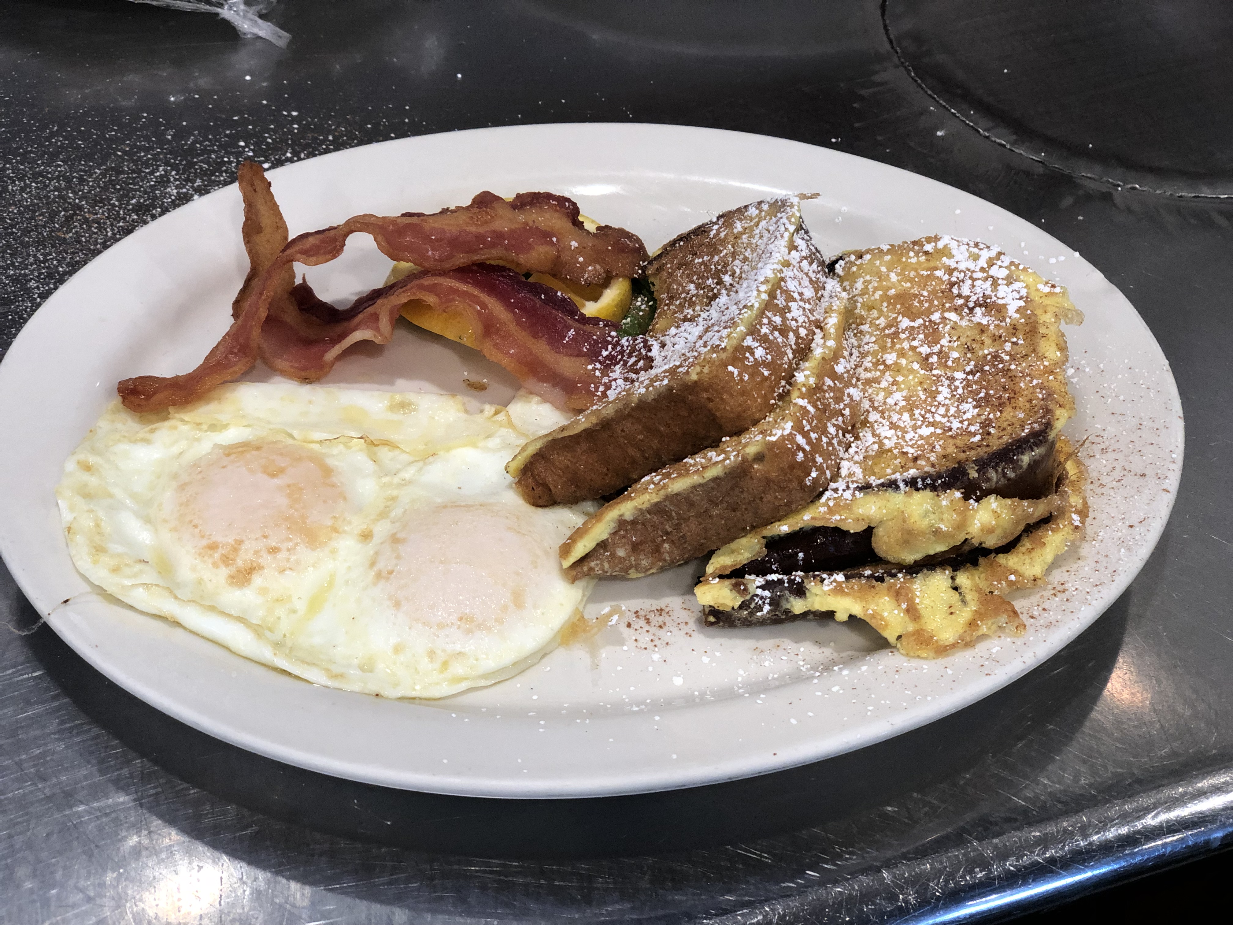 Order 4. Two Eggs, 2 French Toast and 2 Bacon Combination Breakfast food online from Roxsbury Deli store, Port Hueneme on bringmethat.com