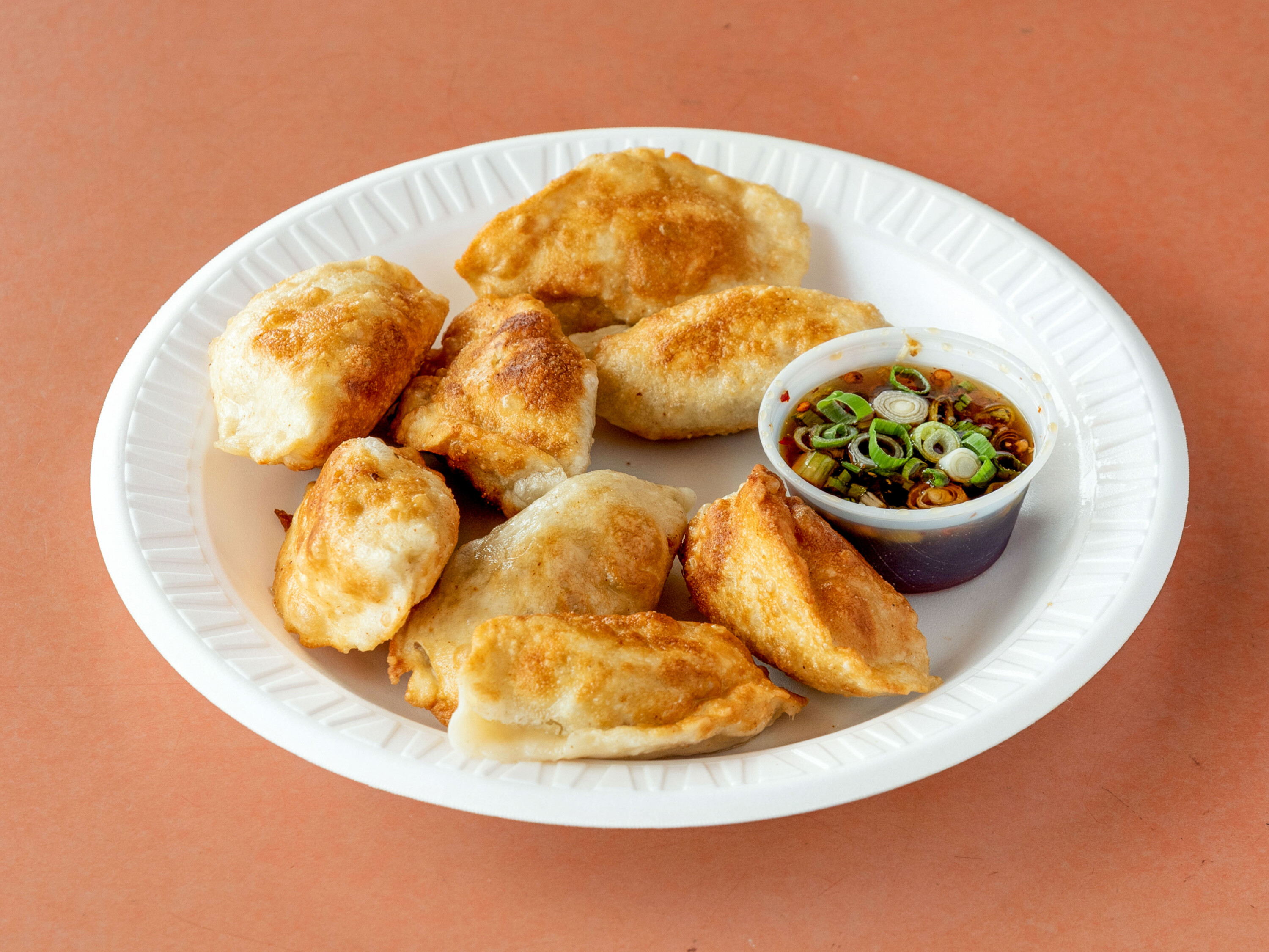 Order 6 Piece Peking Ravioli food online from May S Cafe Chinese Food store, Medford on bringmethat.com