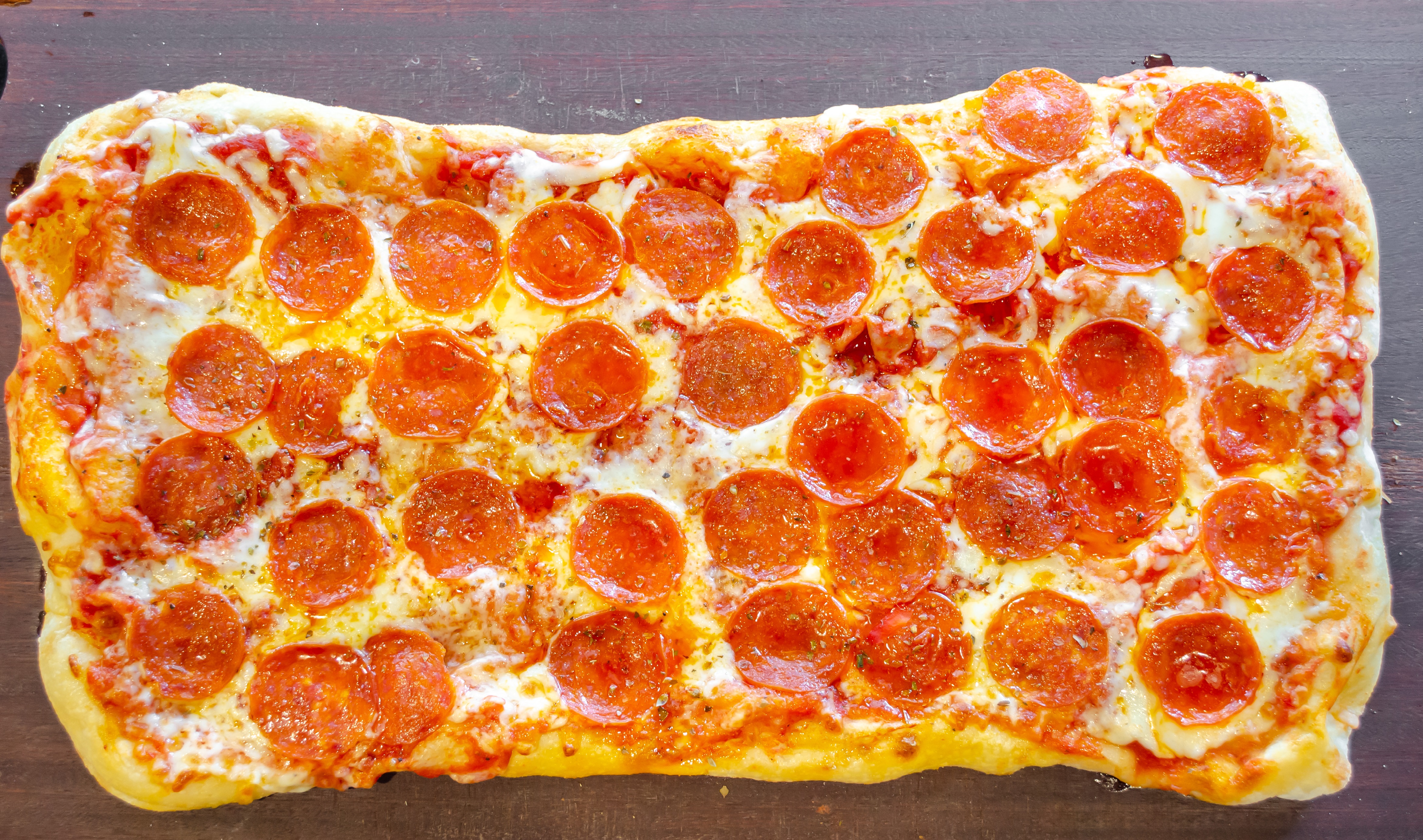 Order 12" x 17" Pepperoni Pie food online from IL Baretto To Go store, New York on bringmethat.com