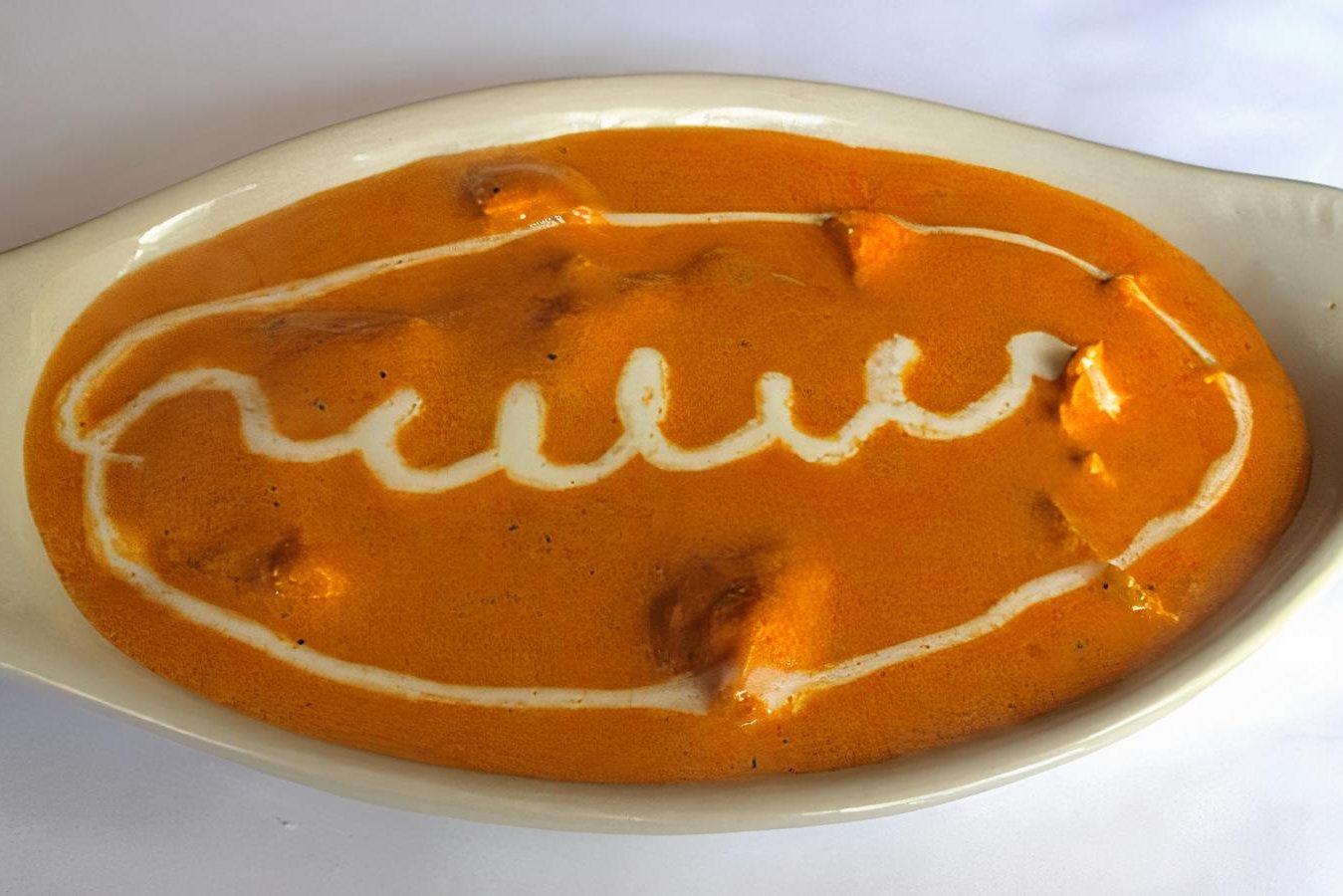 Order Butter Chicken Masala food online from Om Indian Cuisine store, San Francisco on bringmethat.com
