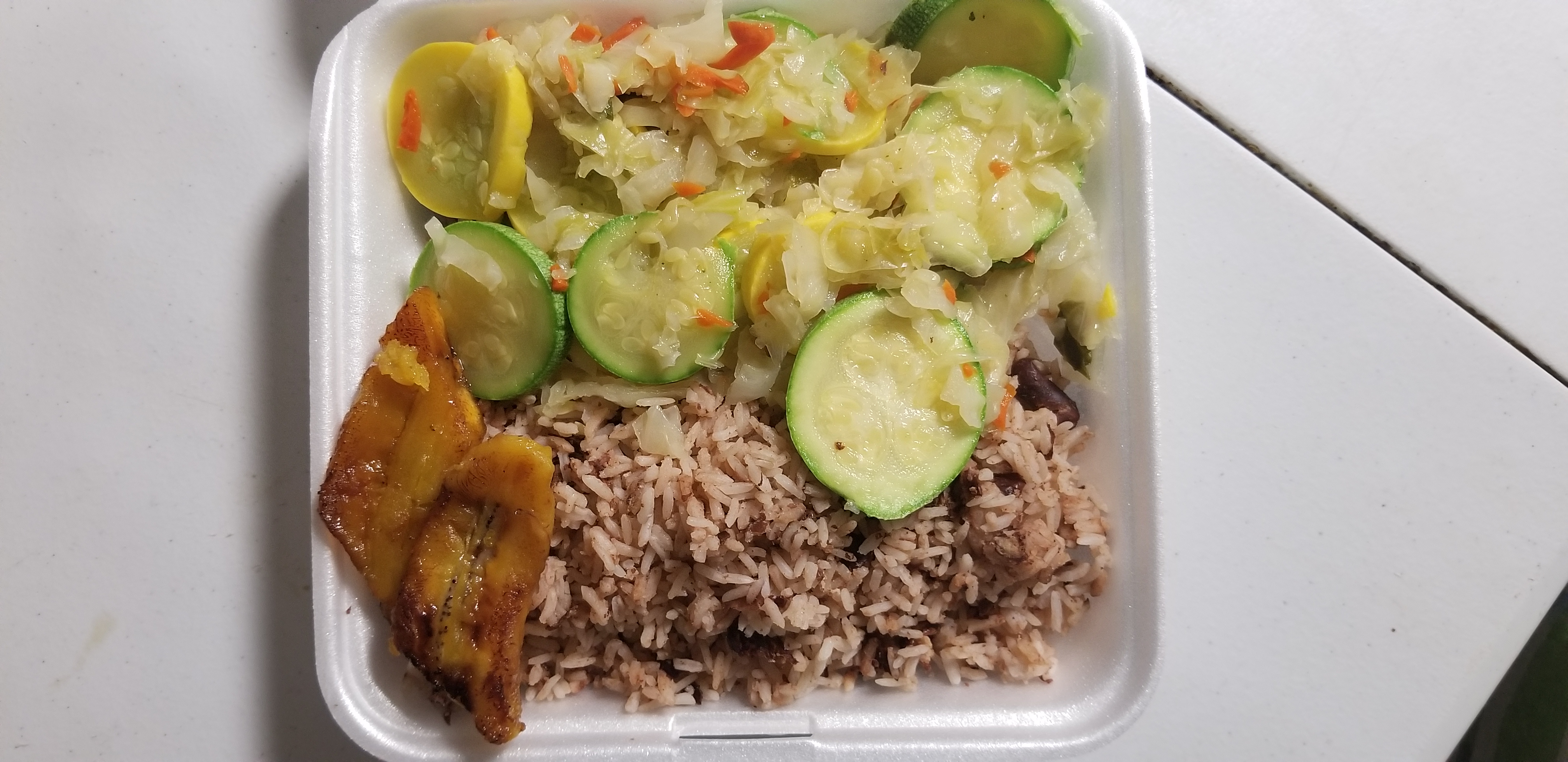 Order Vegetarian Plate food online from Huzzys Jamaican Restaurant store, Houston on bringmethat.com
