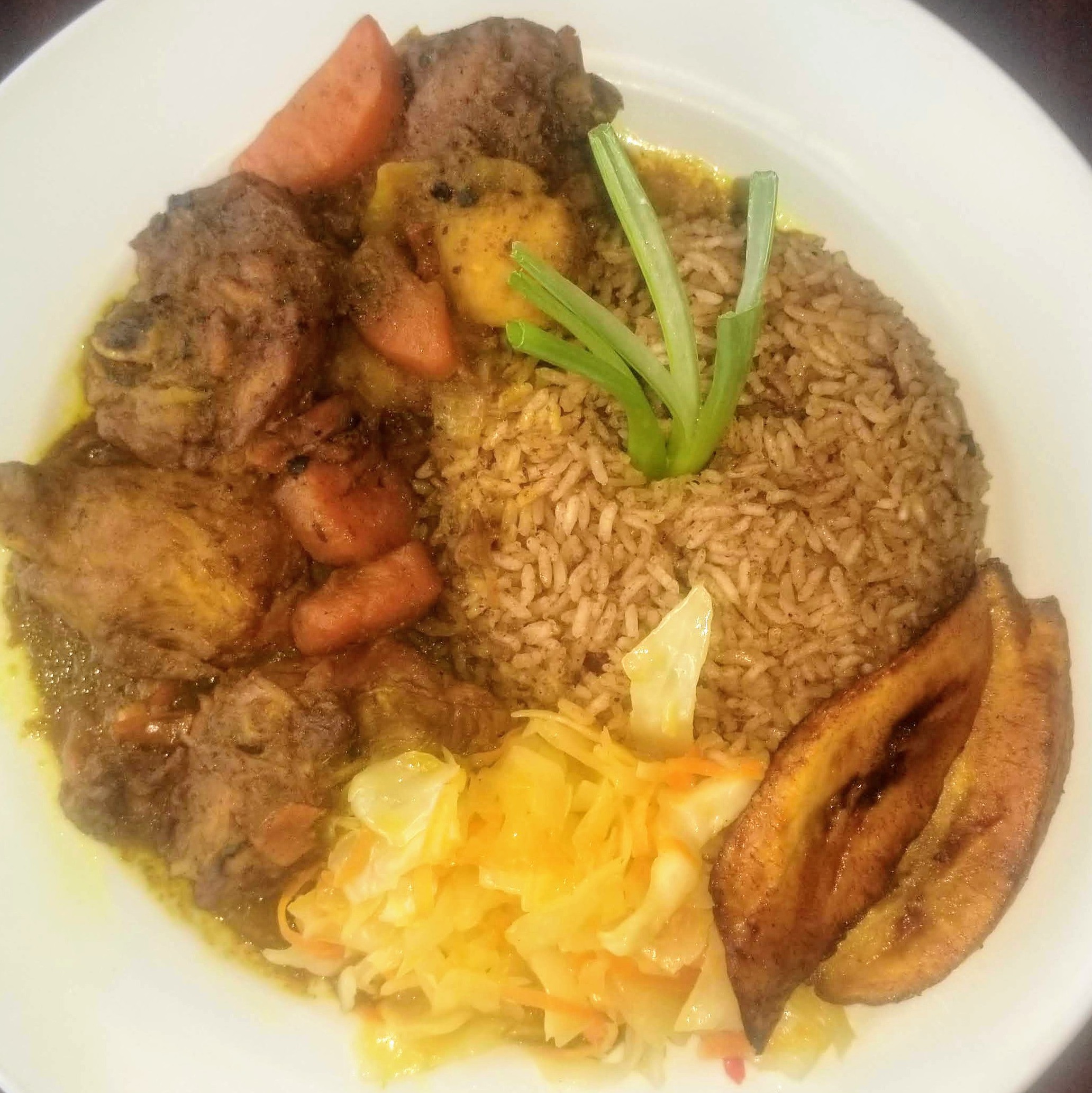 Order Curry Goat Platter food online from Caribbean Grill store, Montclair on bringmethat.com