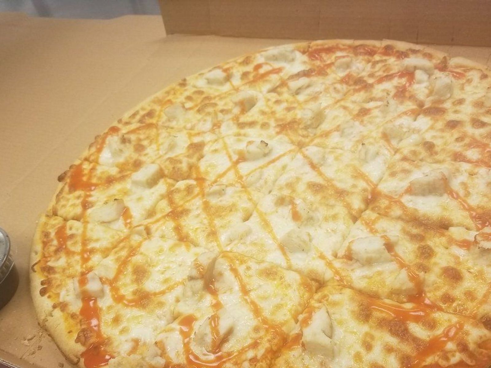 Order BUFFALO CHICKEN PIZZA food online from Rocky's Pizza store, Chicago on bringmethat.com