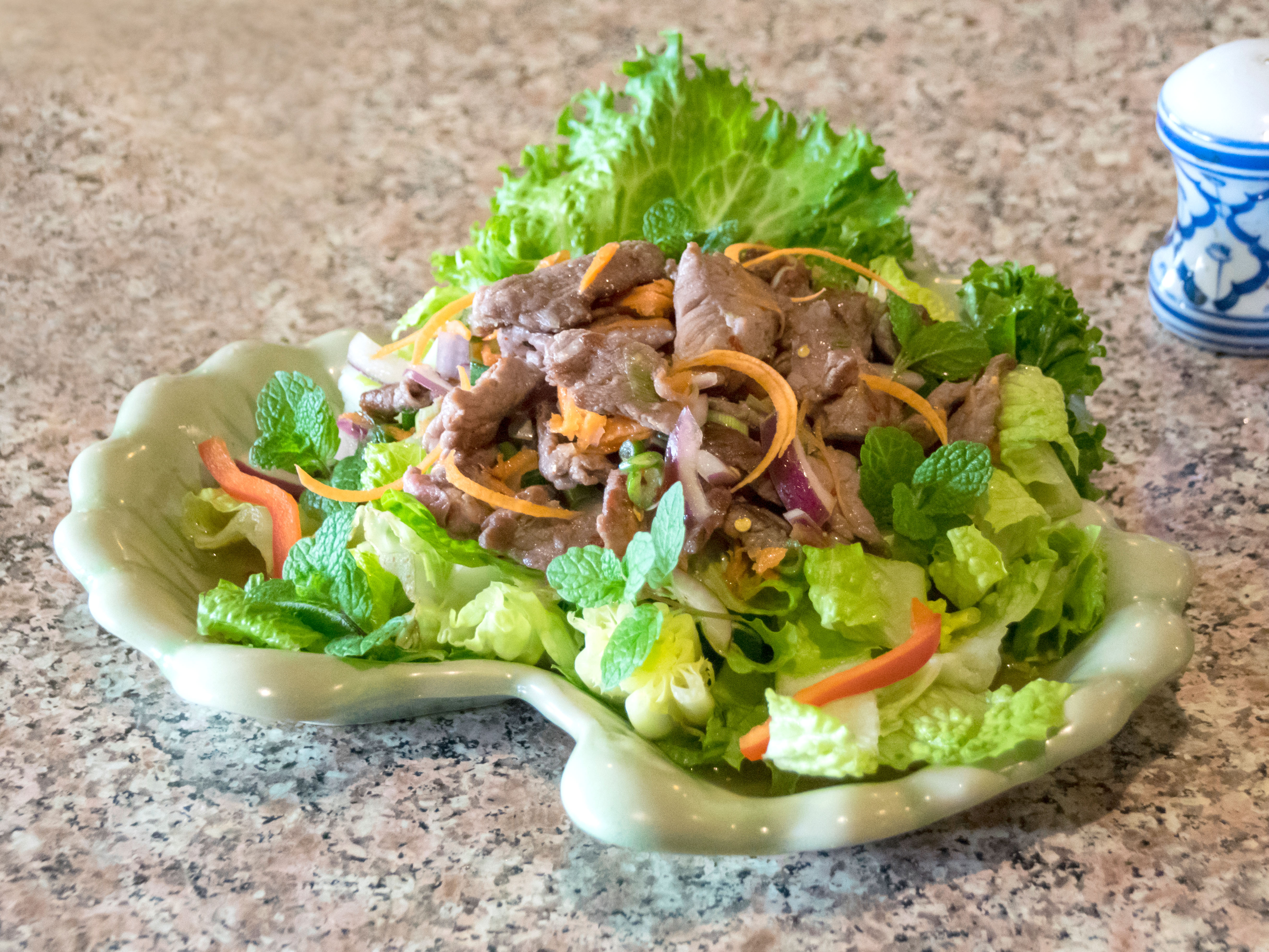 Order Beef Salad (Yum Neur) สลัดเนื้อ food online from Patpong Thai Cuisine store, San Francisco on bringmethat.com