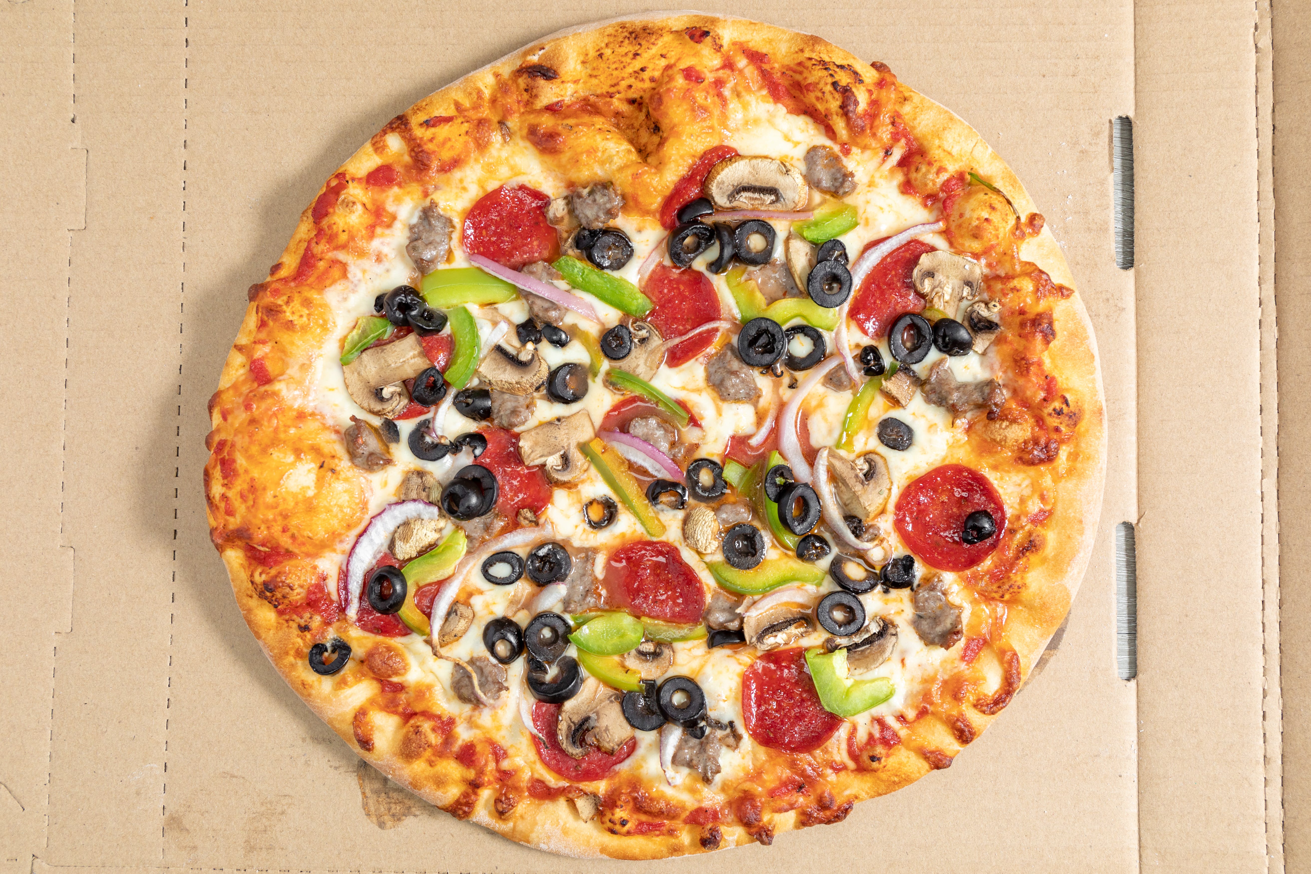 Order Pizza with Unlimited Toppings - Large 16'' food online from House of Corned Beef store, Milwaukee on bringmethat.com