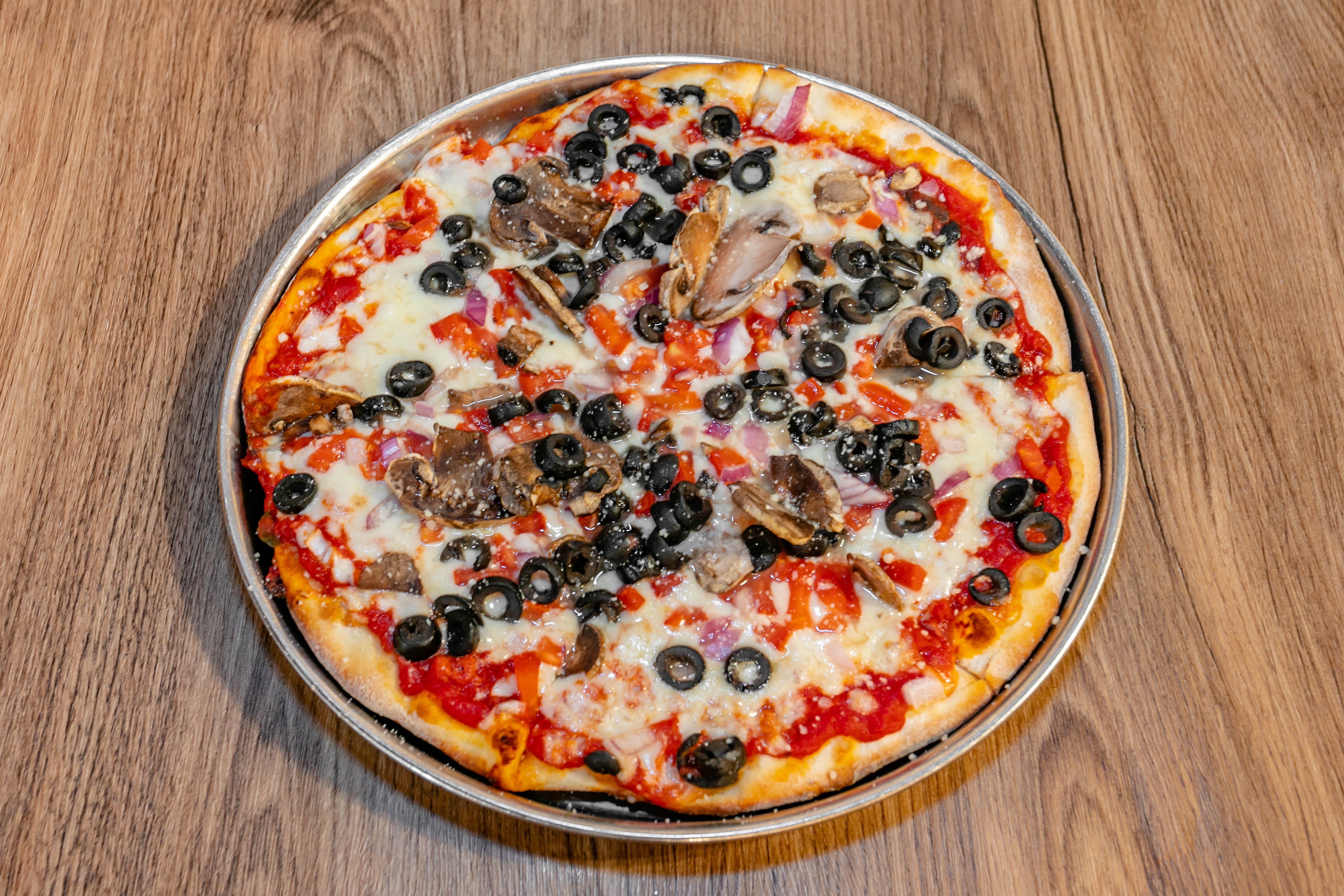 Order Veggie Pizza - 10'' food online from Sopranos Grill store, Braselton on bringmethat.com