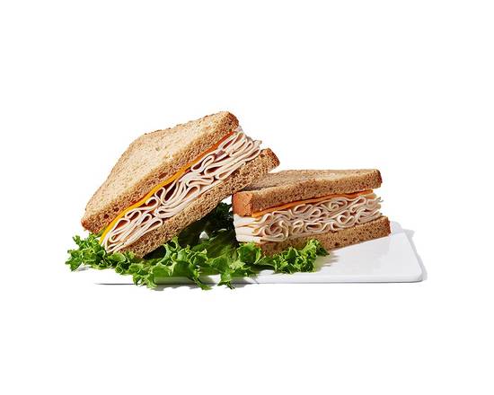 Order Turkey Cheddar on Wheat Sandwich food online from Chevron Extramile store, Vancouver on bringmethat.com
