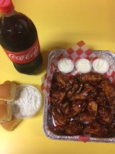 Order #14 Family Super Special ( 20pc Buffalo Wings, 2 Order Fries, 4 Rolls, Large Coleslaw & 2liter Soda  food online from Chicken Delight of Rahway store, Rahway on bringmethat.com