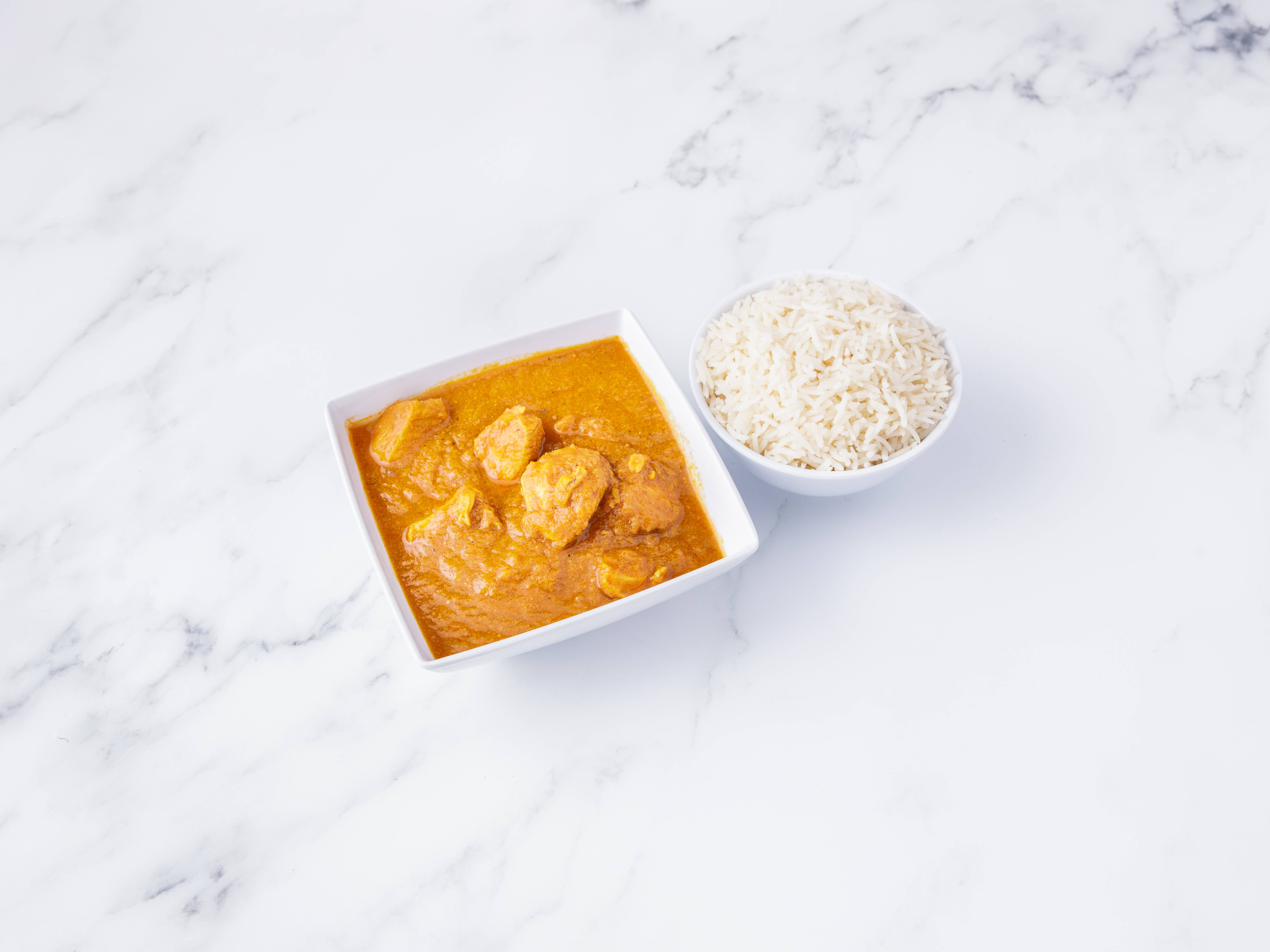Order Chicken Curry food online from Dosa Grill store, Syracuse on bringmethat.com