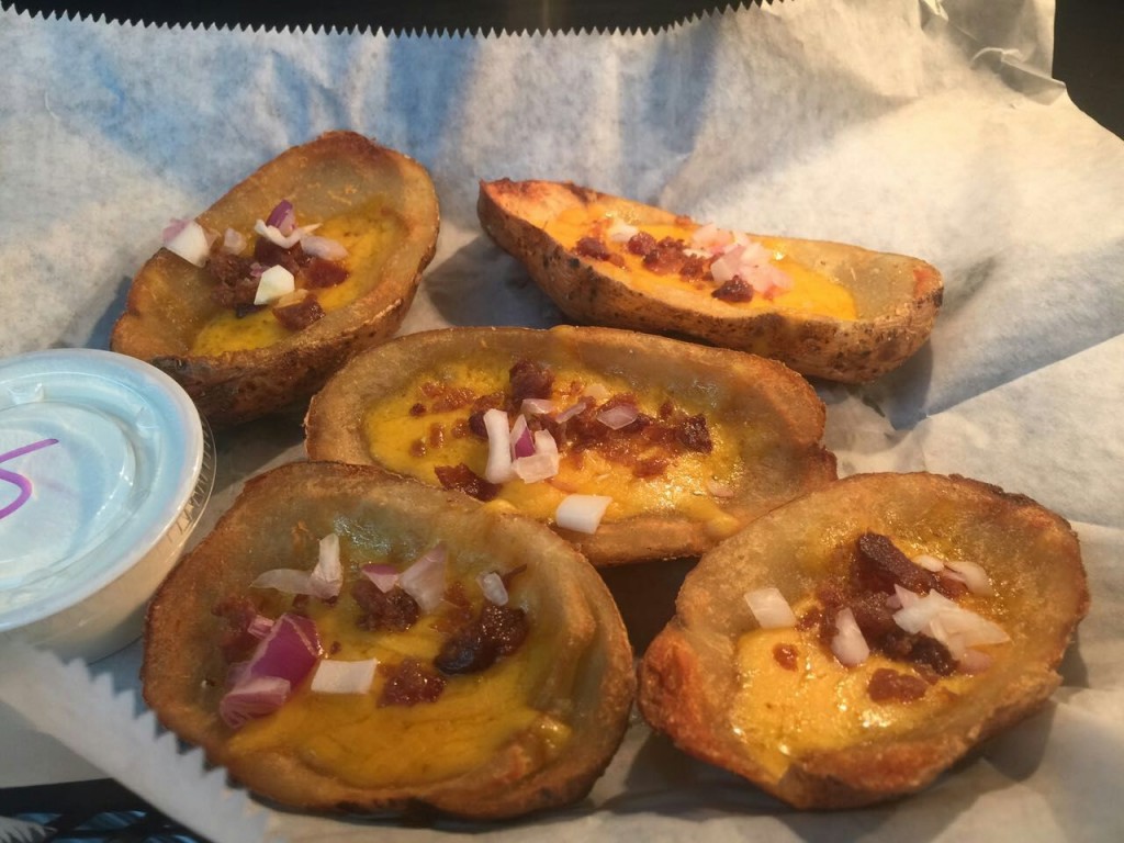 Order Loaded Potato Skins food online from Fairborn Place Bbq store, Fairborn on bringmethat.com