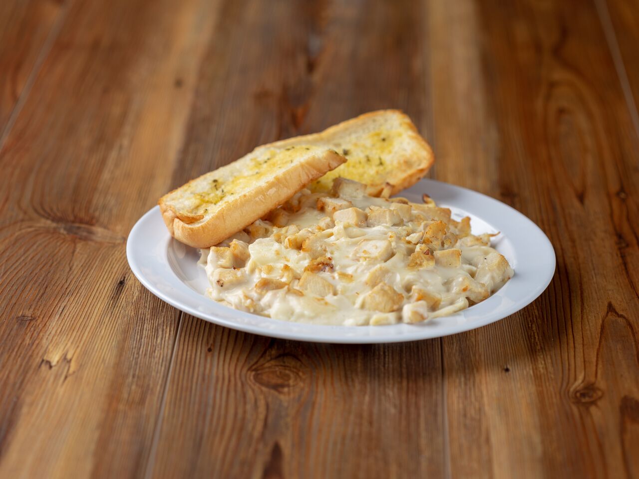 Order Chicken Alfredo Pasta Dinner food online from Romeo's Pizza and Pasta store, Wadsworth on bringmethat.com