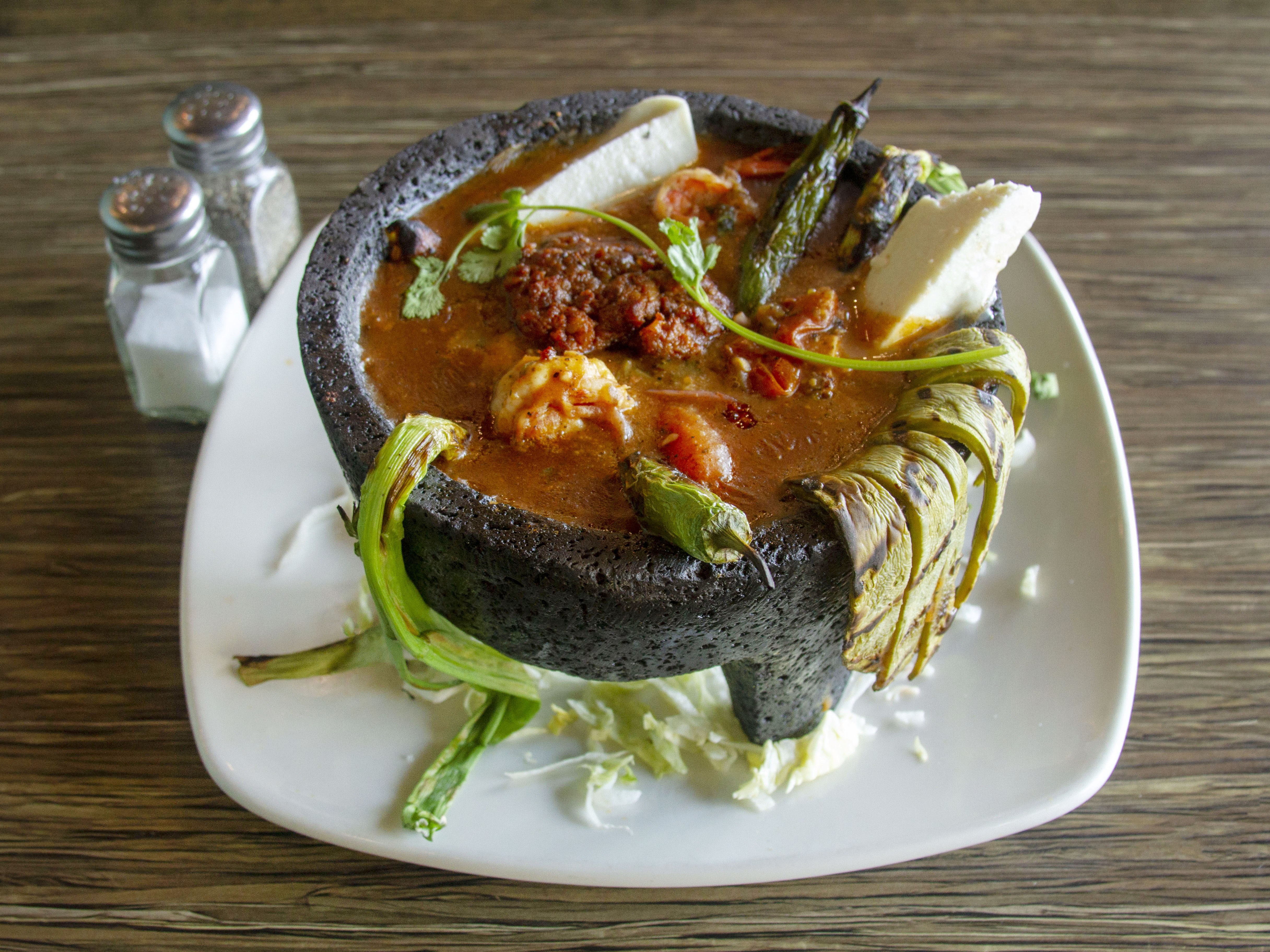 Order Molcajete Supremo food online from Que Pasa Mexican Cafe store, Visalia on bringmethat.com
