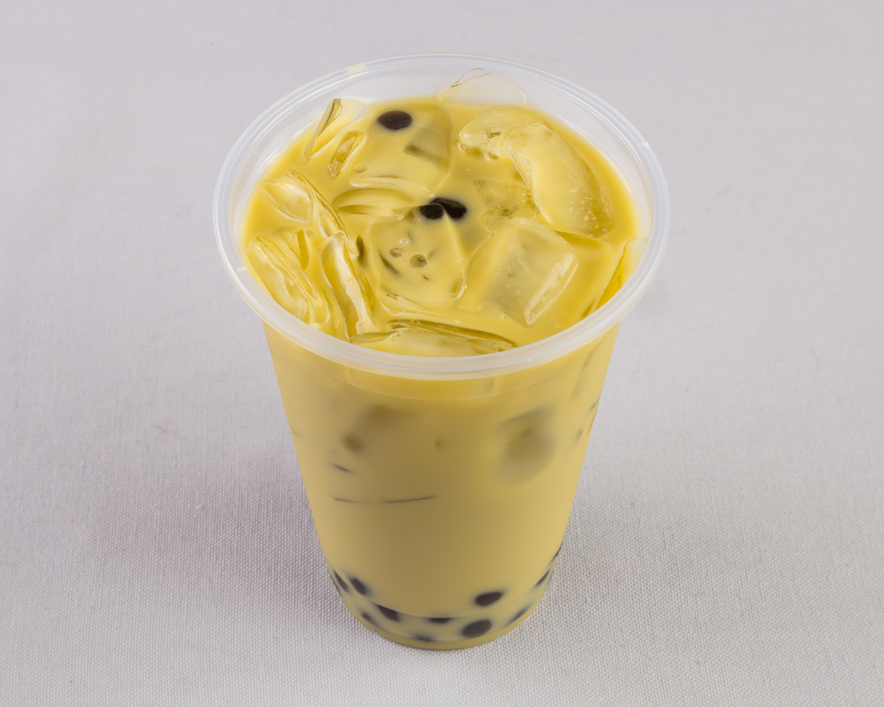 Order Thai Green Tea food online from In D Kitchen store, Houston on bringmethat.com