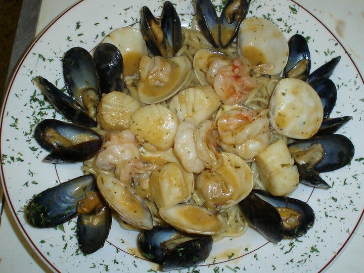 Order Zuppa di Pesce - Entree food online from Aloy's Italian Restaurant store, Poughkeepsie on bringmethat.com