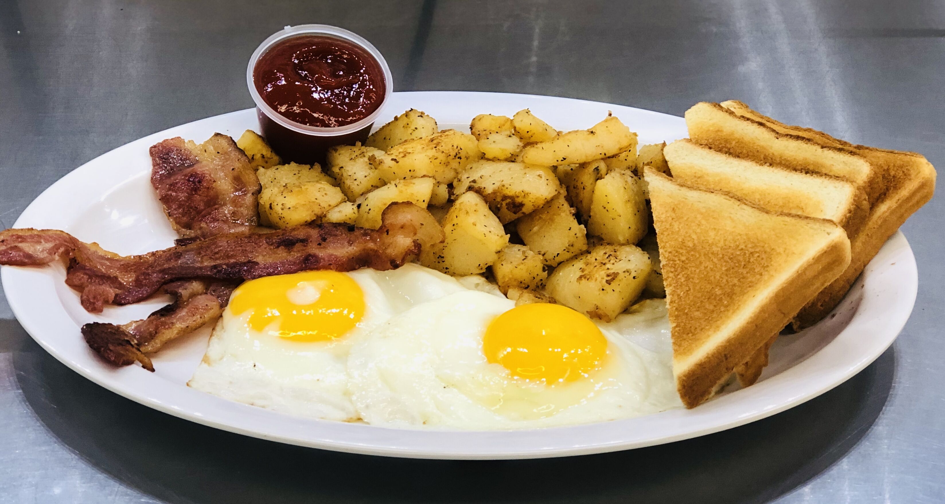 Order #1 Home Fries, Eggs, and Breakfast Meat food online from 270 Deli NY store, Hempstead on bringmethat.com