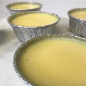 Order Flan food online from Savoia Pastry Shoppe store, Rochester on bringmethat.com