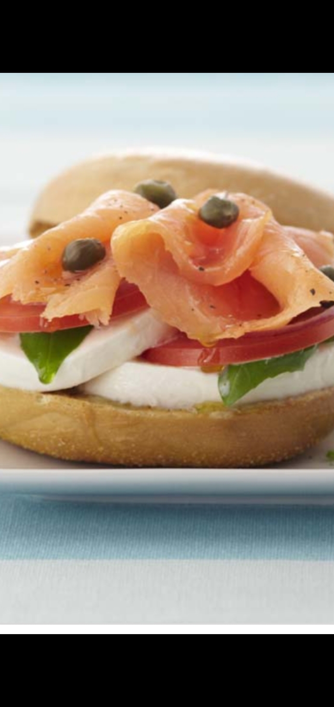 Order Nova Smoked Salmon Fresh Mozzarella Tomatoes Spinach & Capers Sandwich  food online from American Gourmet Foods Deli store, New York on bringmethat.com