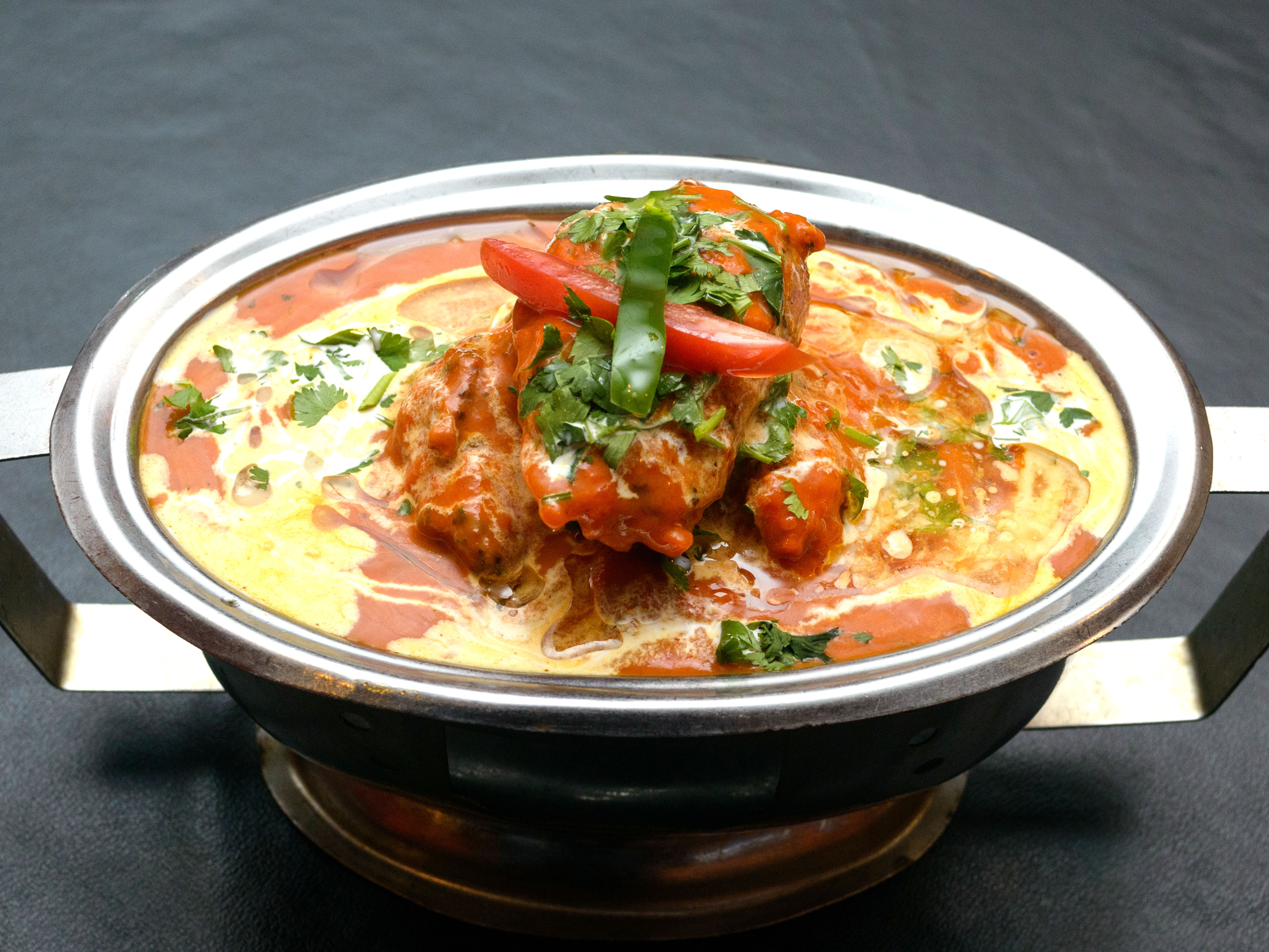 Order Chicken Tikka Masala food online from House of India store, Loves Park on bringmethat.com