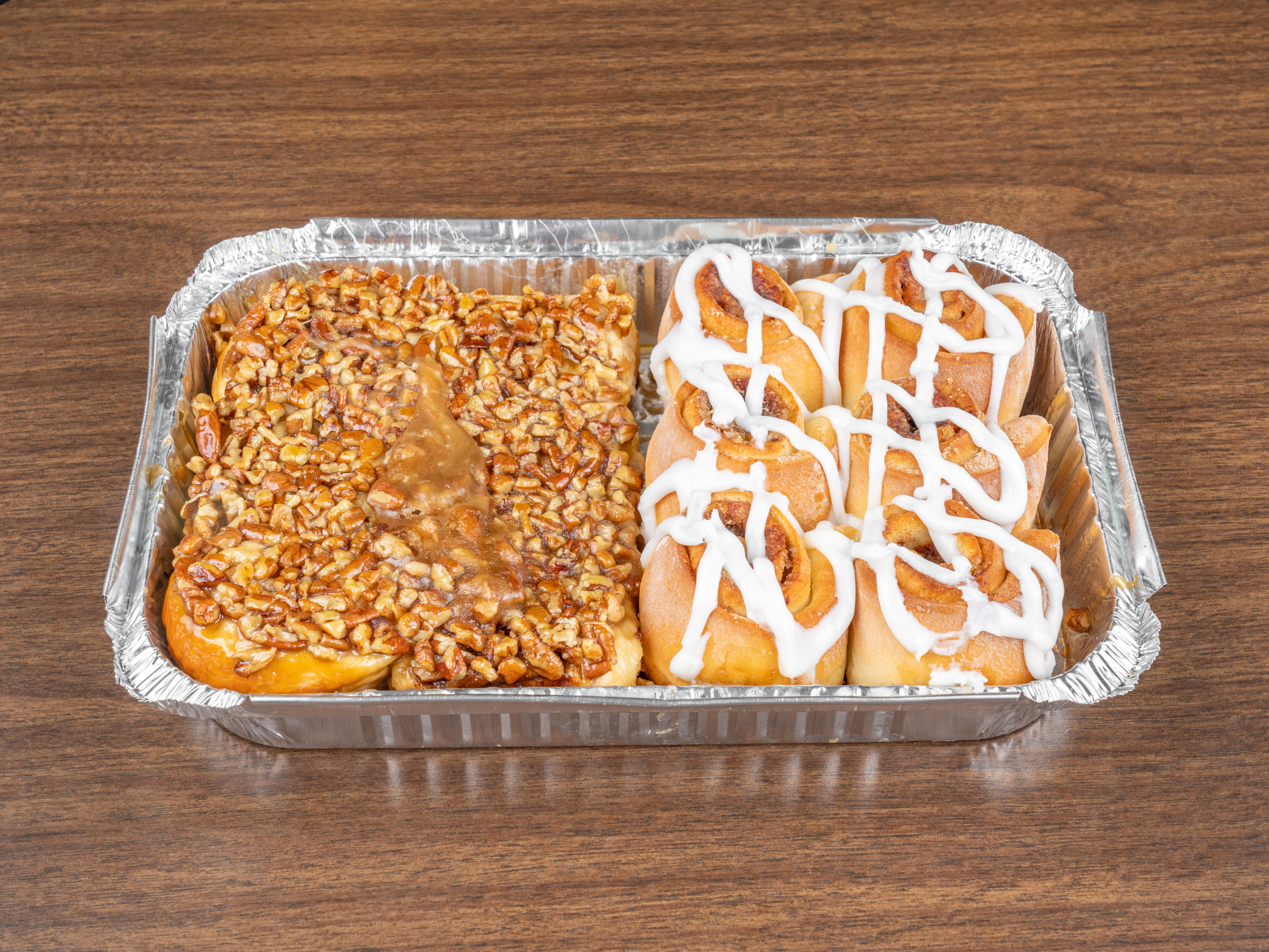 Order 6 Piece Original Cinnamon Rolls and 6 Piece Pecan Sticky Buns Pack food online from Cinnamon's Bakery store, Sugar Land on bringmethat.com
