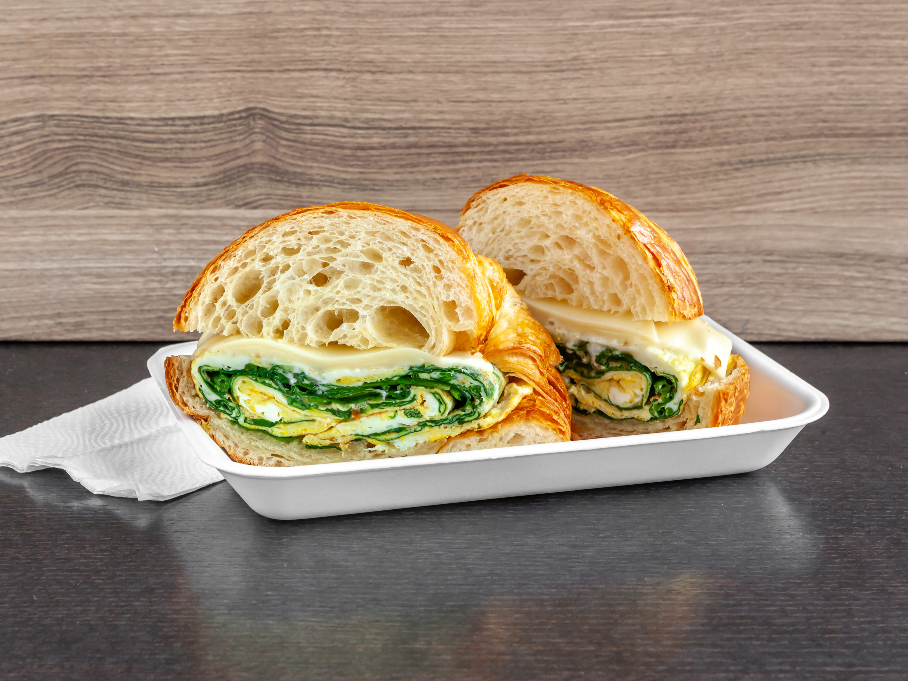 Order Croissant with Egg, Cheese, Spinach food online from Dc Donut Cafe store, Granada Hills on bringmethat.com