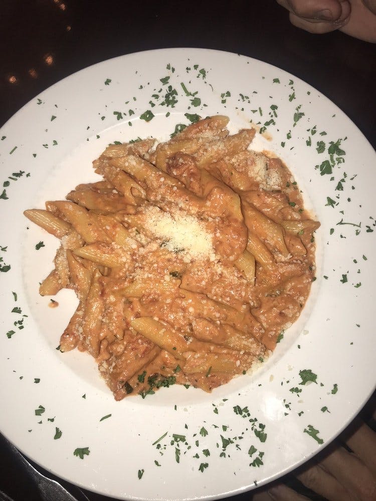 Order Penne Ala Vodka - Dinner food online from Ducatis Pizzeria & Trattoria store, Myrtle Beach on bringmethat.com