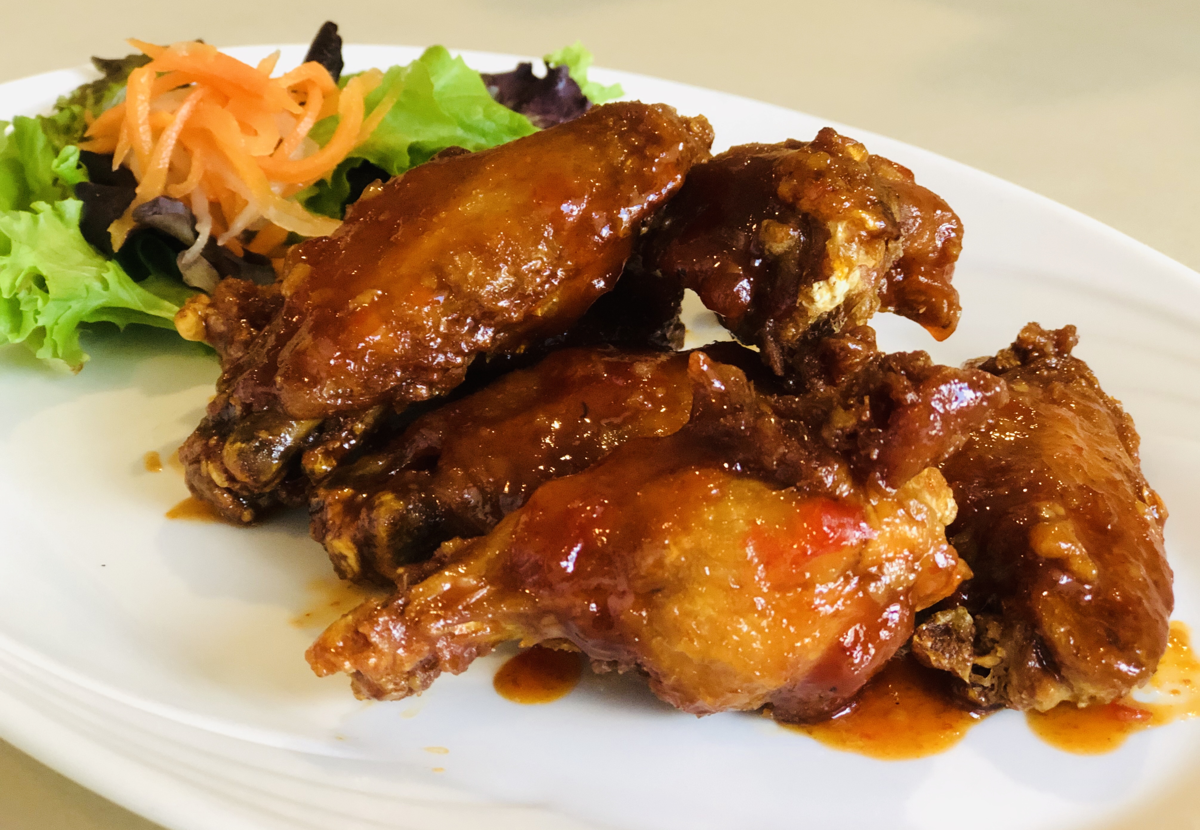Order A18. Spicy Wing food online from Pho and Thai store, Belmont on bringmethat.com