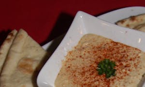 Order *Hummus food online from Zorbas Fine Greek Cuisine store, Albuquerque on bringmethat.com