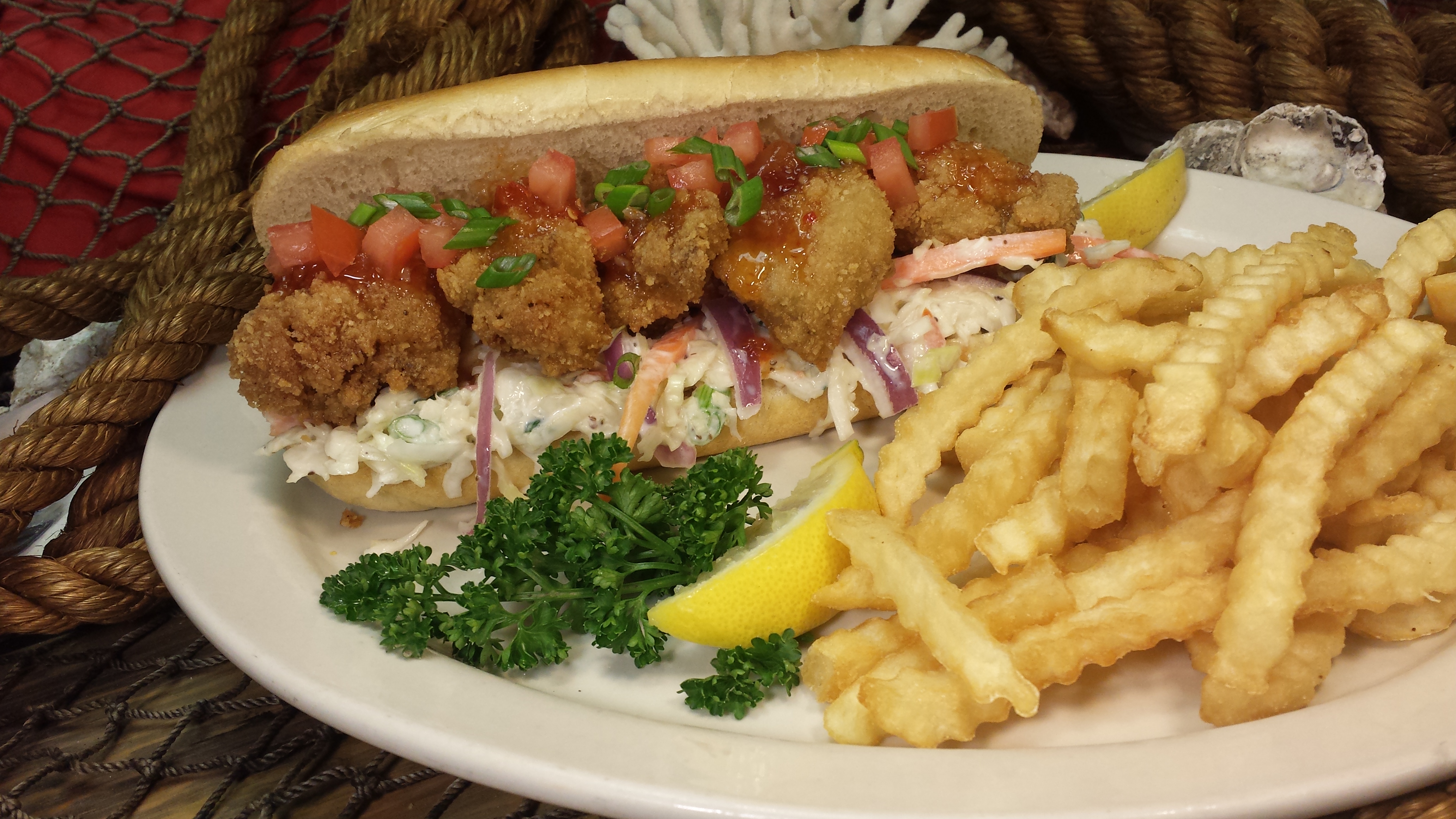 Order Captain's Po'boys food online from Kingfish store, Jeffersonville on bringmethat.com