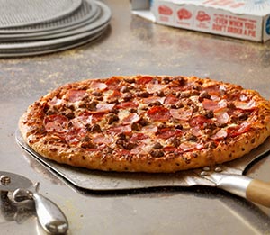 Order MeatZZa Feast Pizza food online from Domino's Pizza store, Fairfield on bringmethat.com