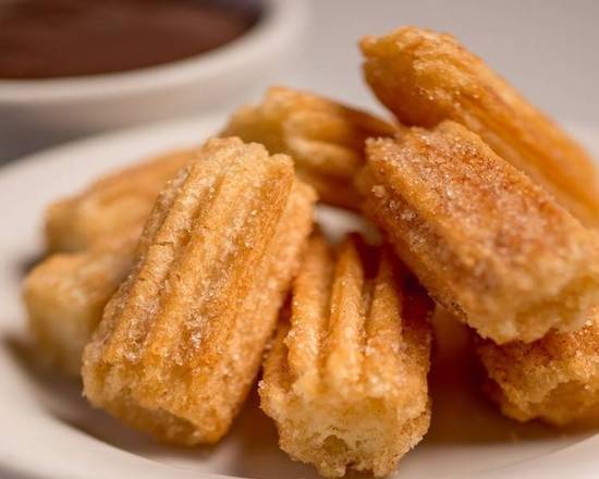 Order Churro Bites (21 Pieces) food online from Tts Tacos & Tortas Cocina Mexicana store, Chicago on bringmethat.com