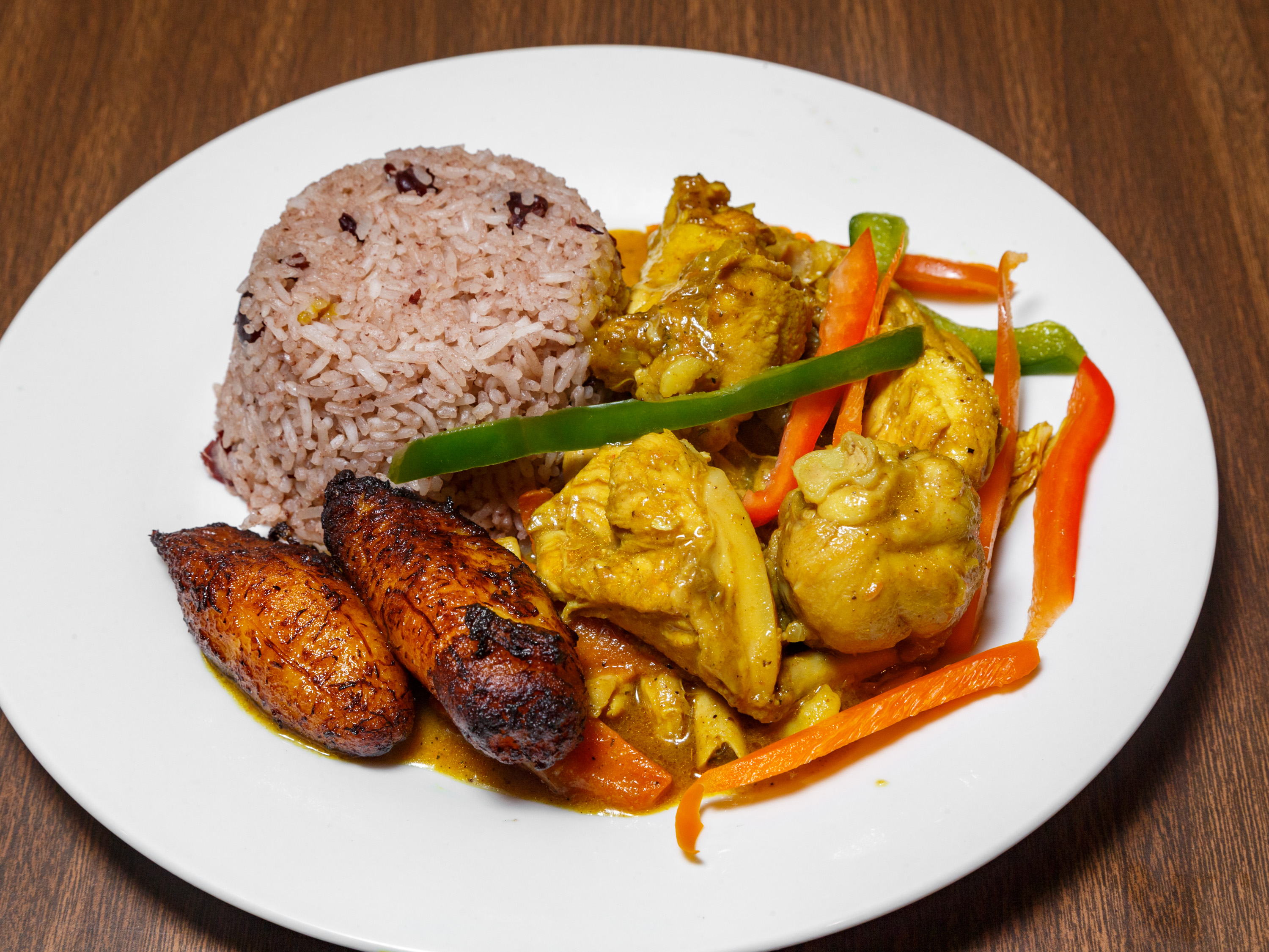 Order Curry Chicken food online from Doug Caribbean Kitchen store, Pittsburgh on bringmethat.com
