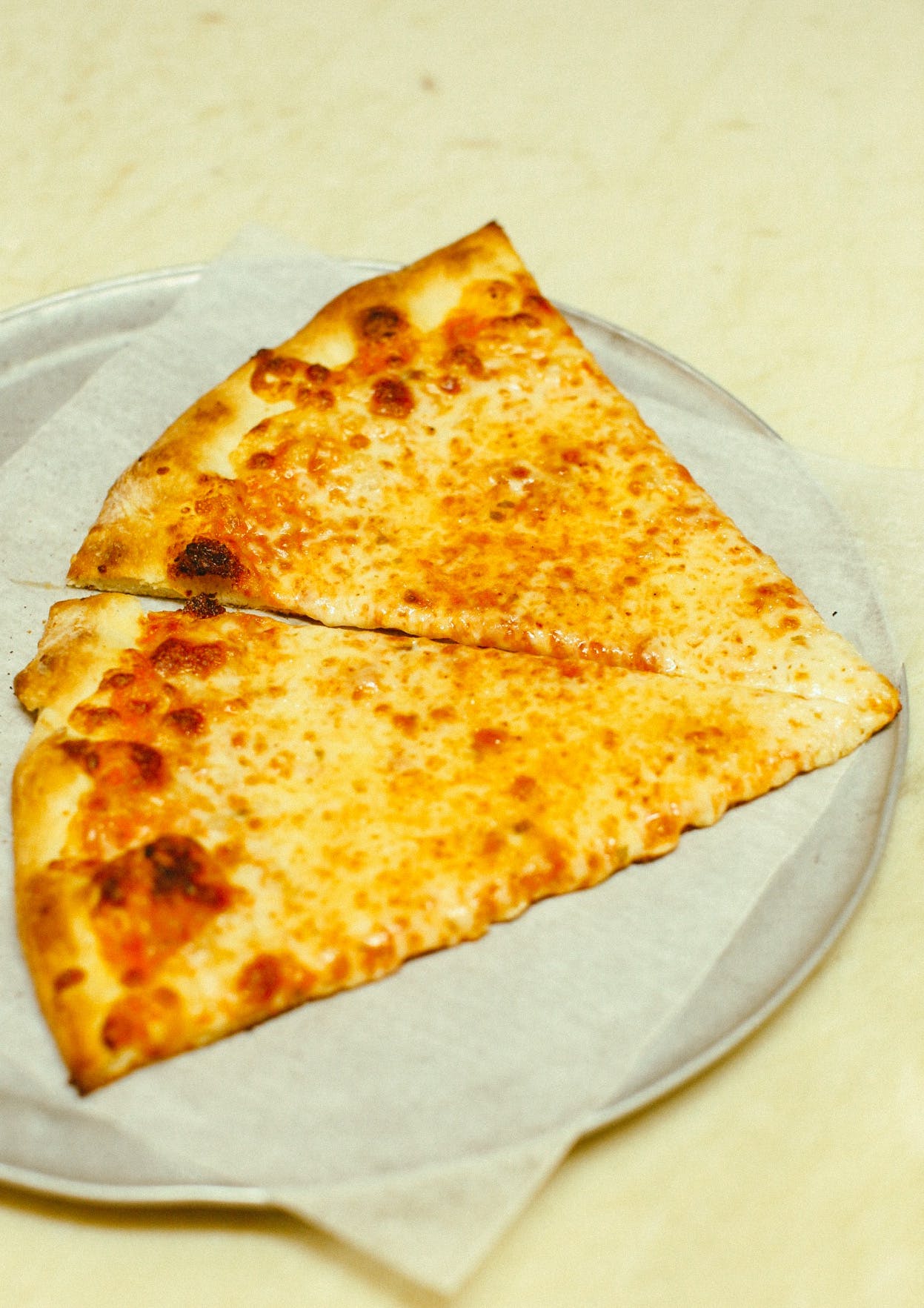 Order Cheese Pizza Slice - Slice food online from Mama Luke store, Farmington on bringmethat.com