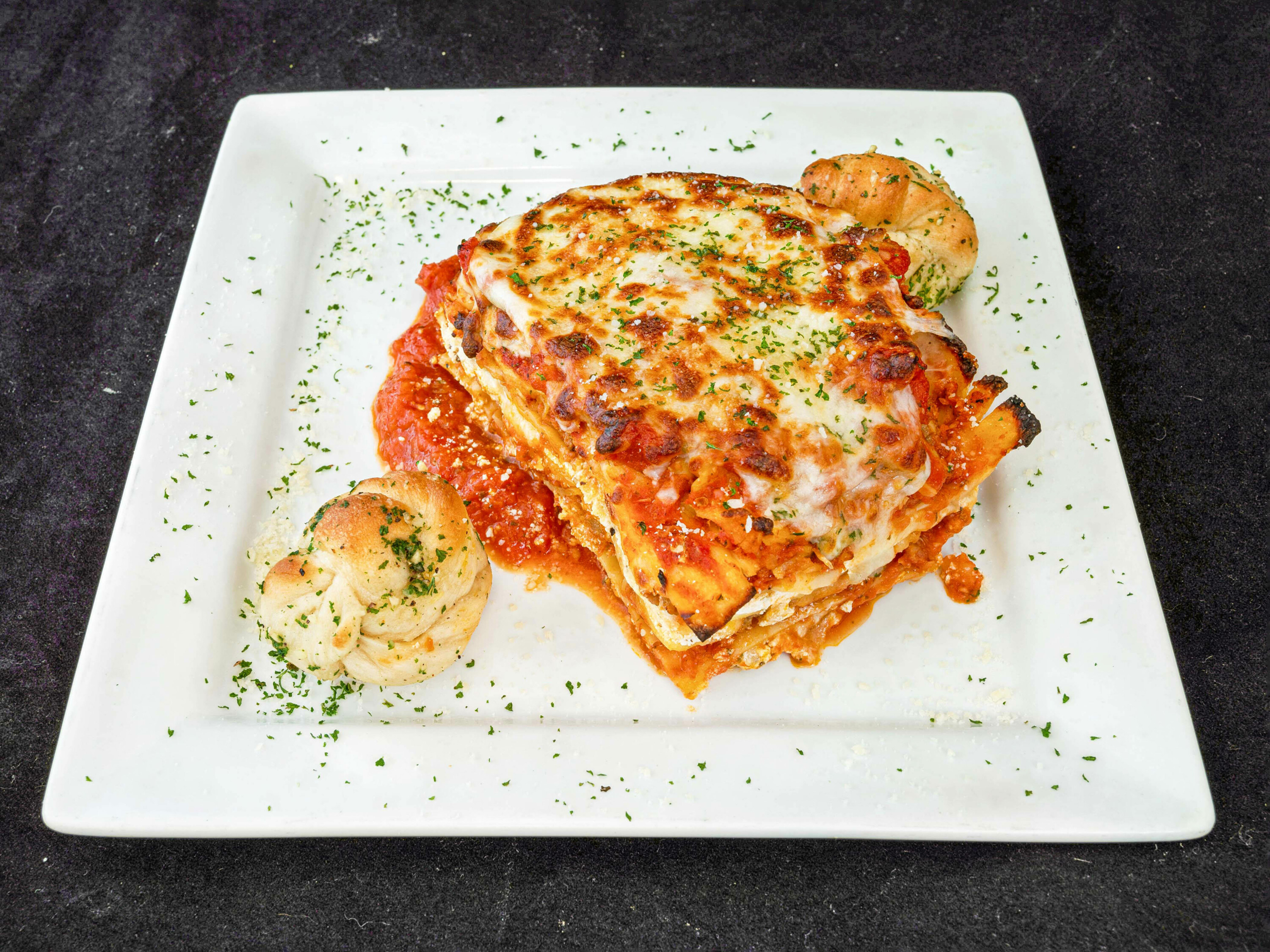 Order Lasagna food online from Bravo NY Pizza store, New Milford on bringmethat.com