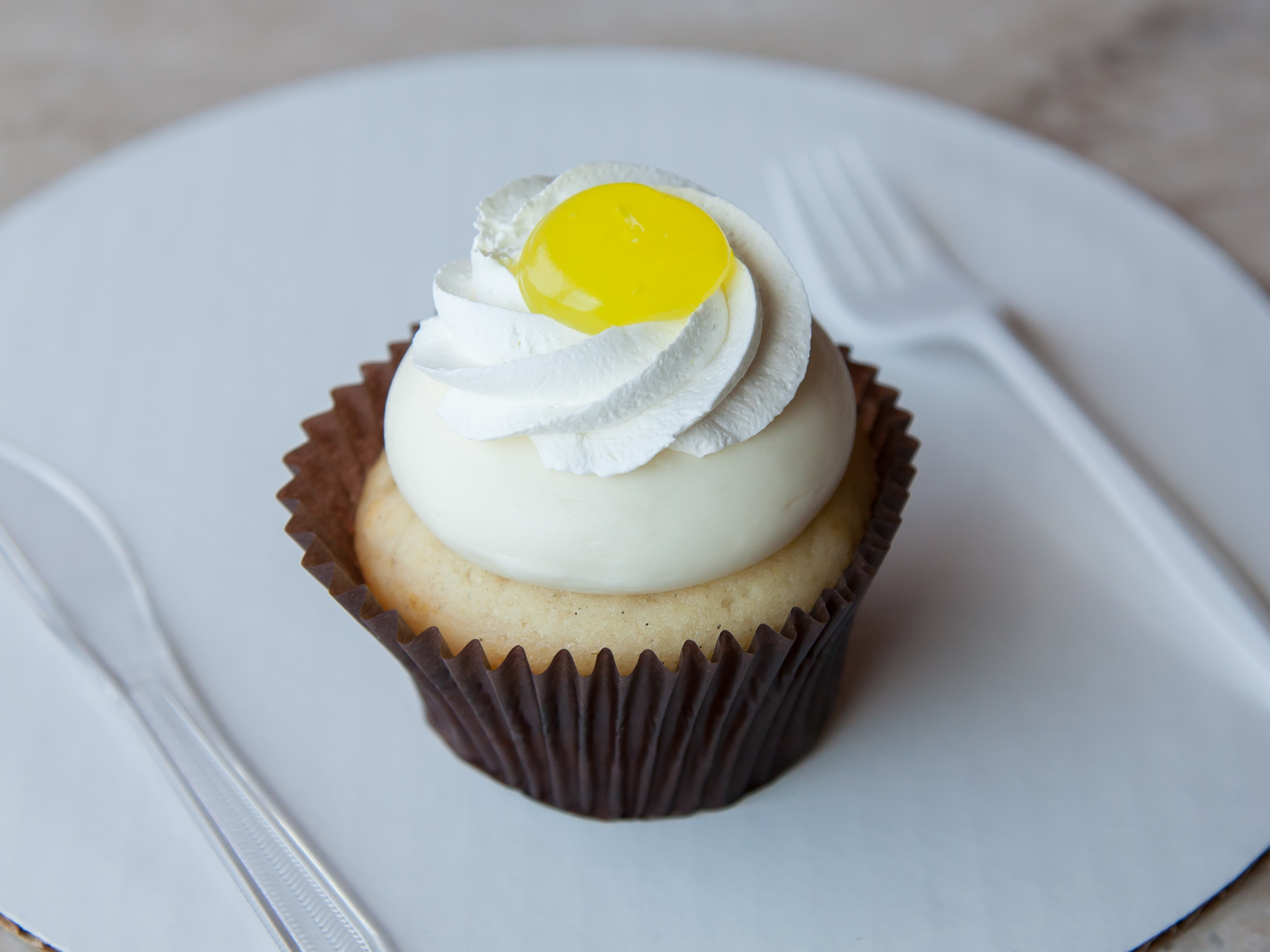 Order Lemon Drop Cupcake food online from Smallcakes store, Naperville on bringmethat.com