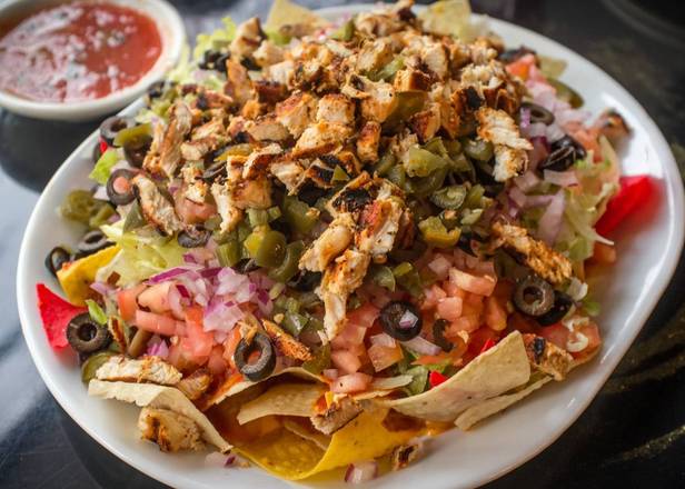 Order Palm Tree Hugger Nachos food online from Vegetarian Mexican Lounge store, Little Elm on bringmethat.com