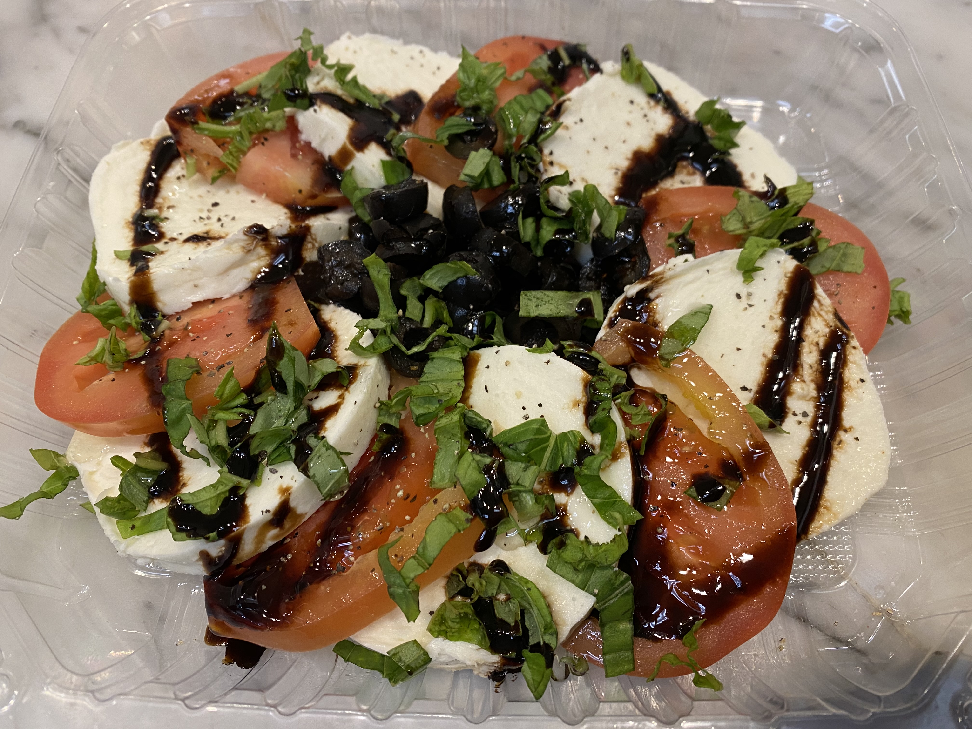 Order Caprese food online from Tonino's Place Pizzeria store, Woodland Hills on bringmethat.com