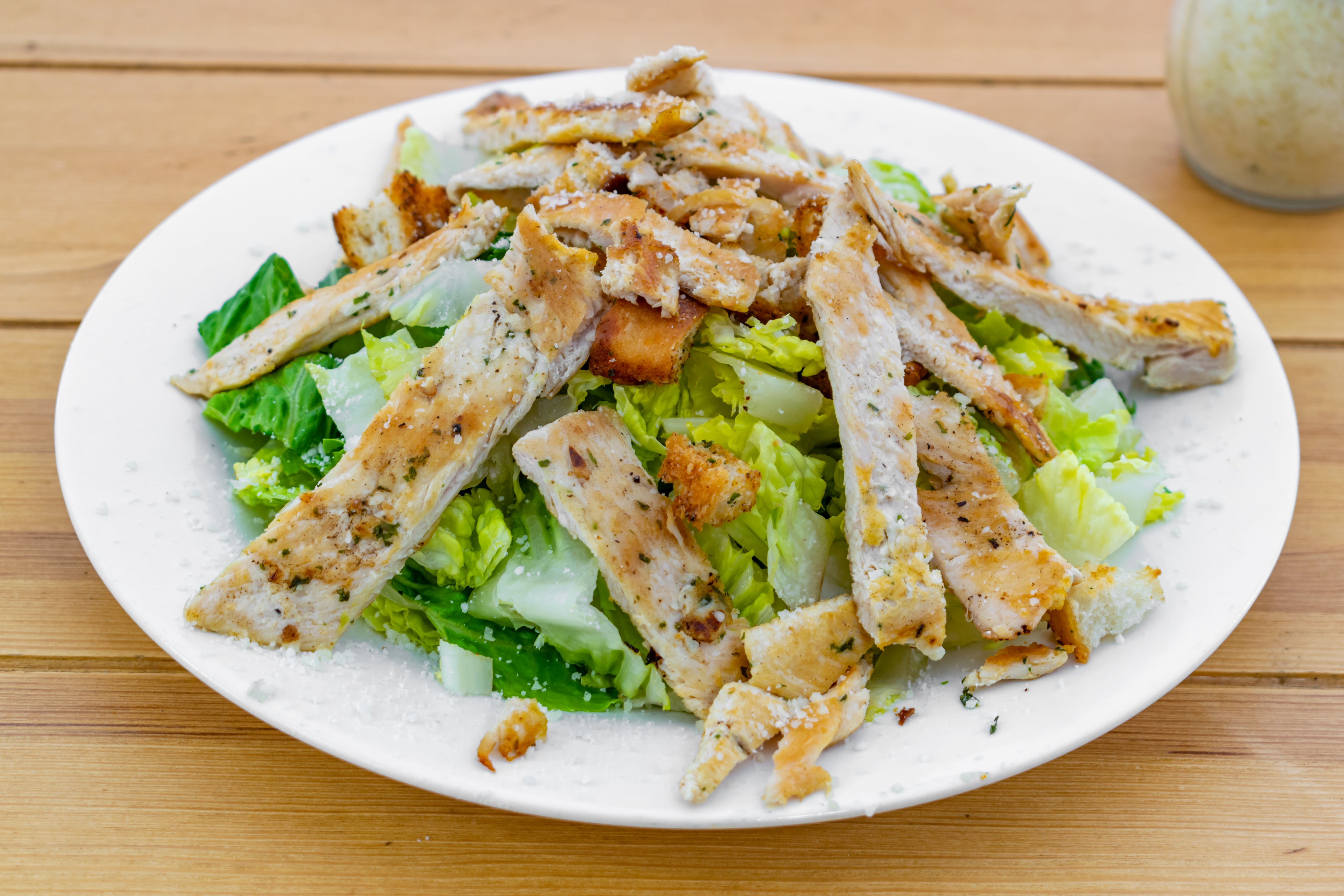 Order Grilled Chicken Caesar Salad - Small food online from Fratelli Pizza & Coffee store, Wayne on bringmethat.com