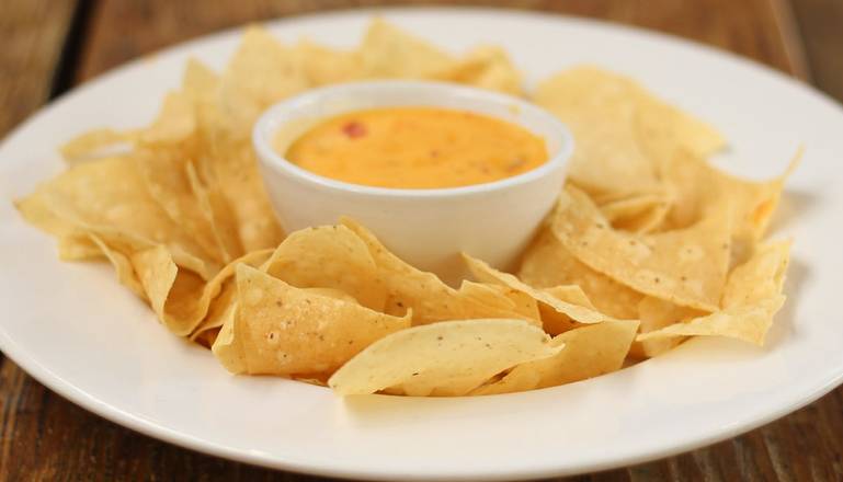 Order Chips & Queso food online from Pluckers store, Webster on bringmethat.com