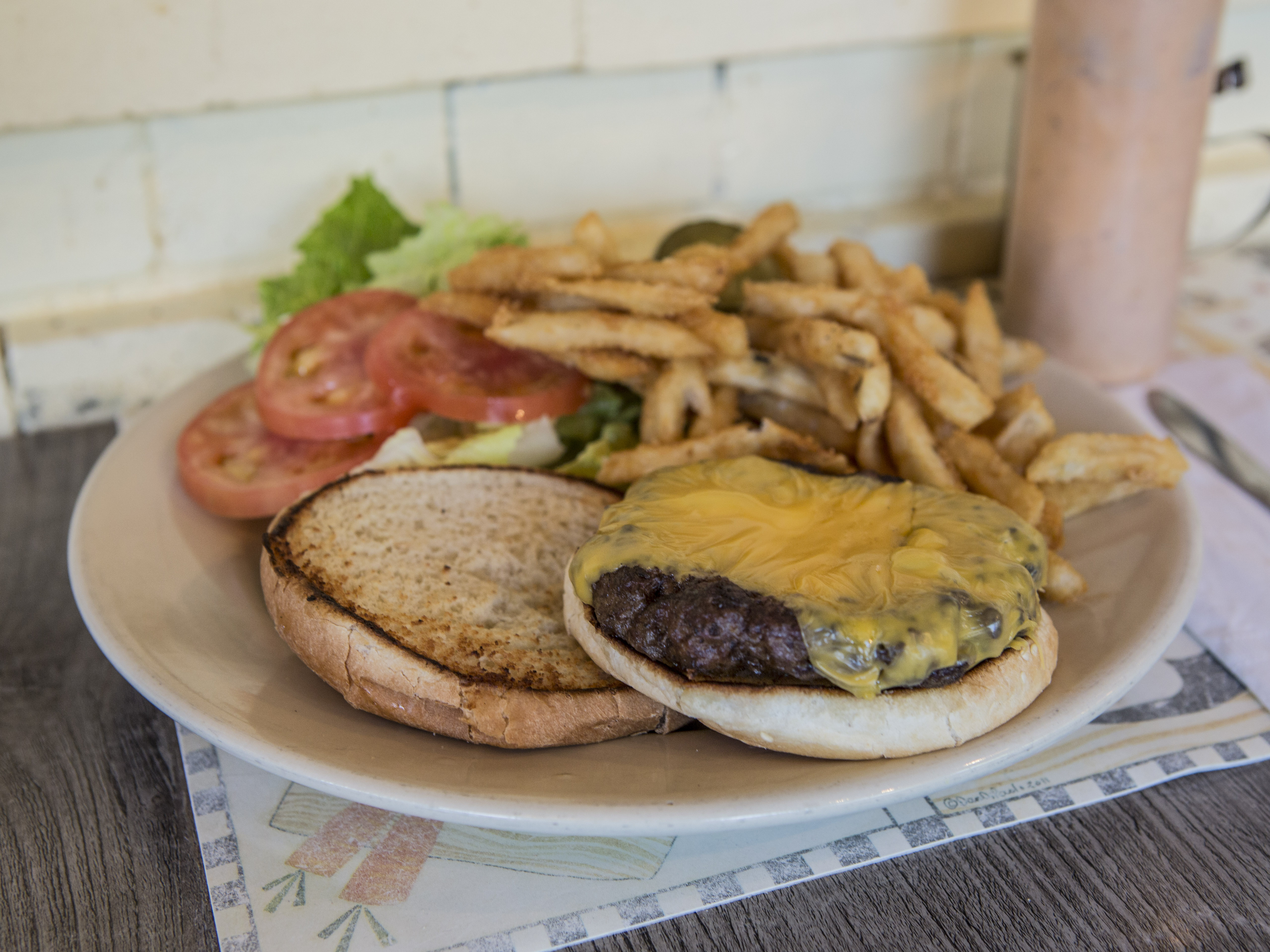 Order Cheeseburger food online from Tom's store, Brooklyn on bringmethat.com