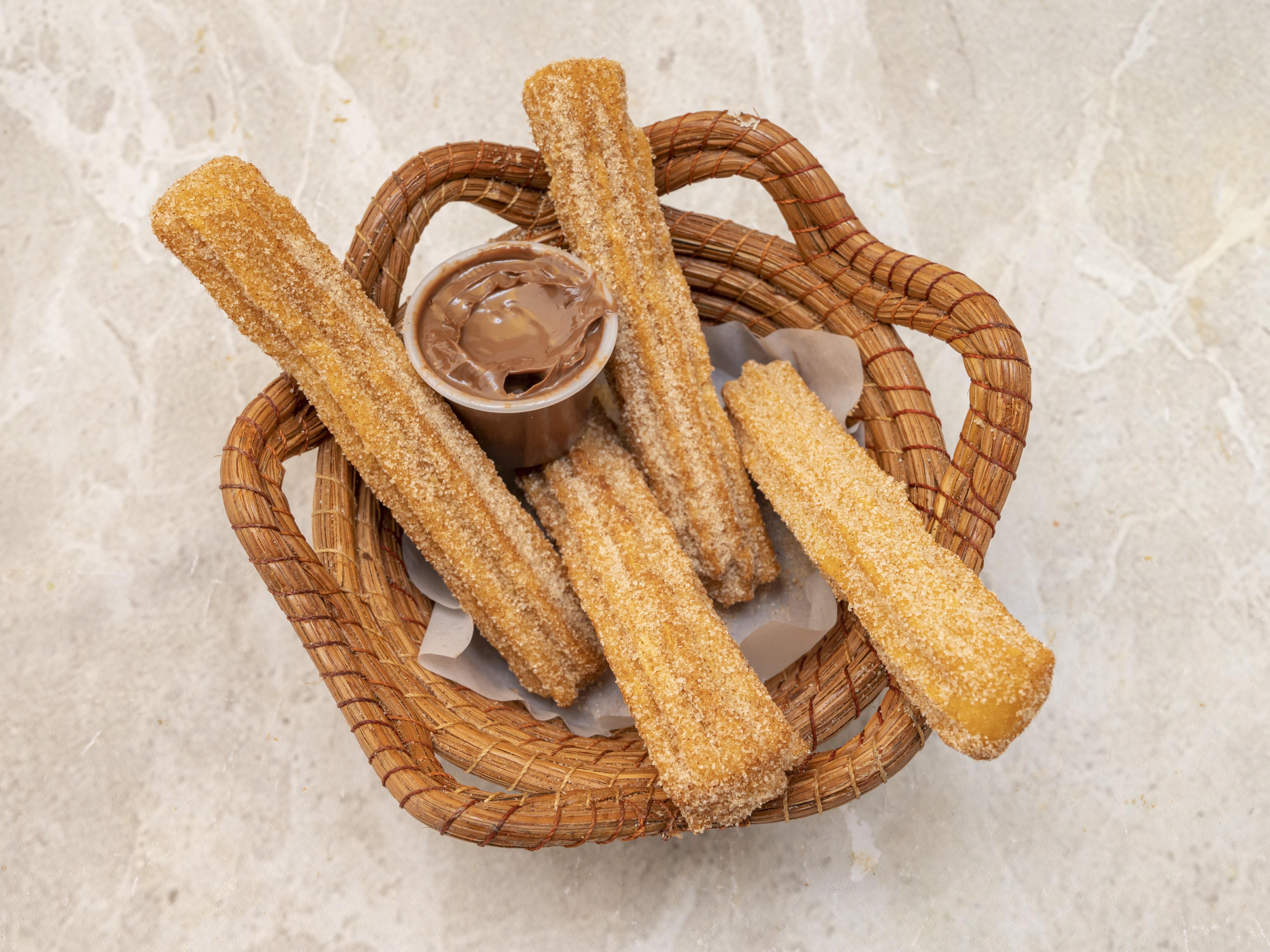 Order Churros with Nutella food online from Folklore Artisanal Taco store, Cranford on bringmethat.com