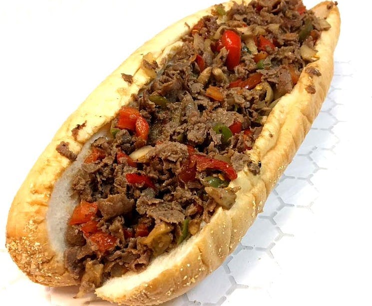 Order Philly Cheesesteak Sub - Small food online from Golden Pizzeria store, Norfolk on bringmethat.com