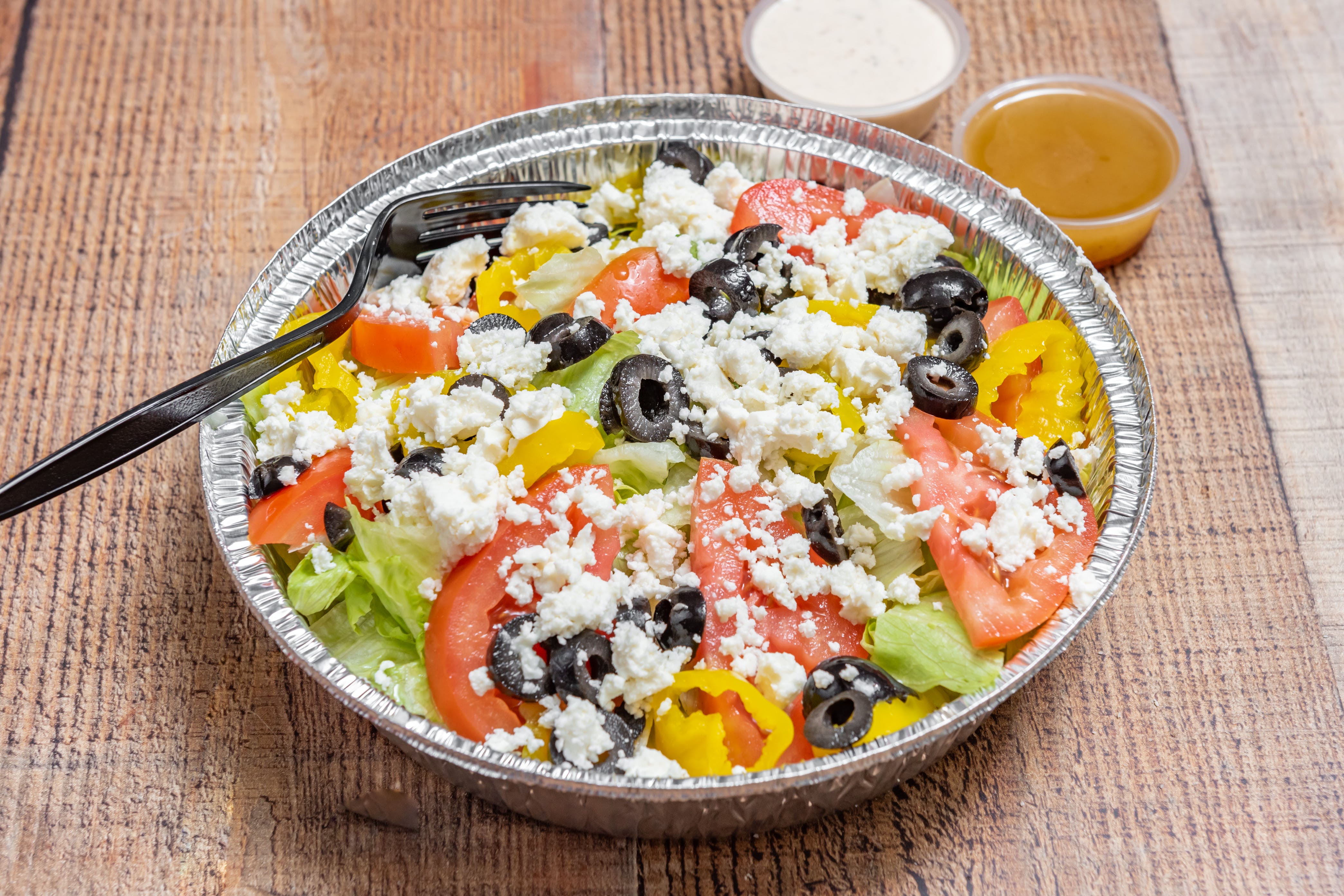 Order Greek Salad - Salad food online from Ray #1 Pizza store, Whitehall on bringmethat.com