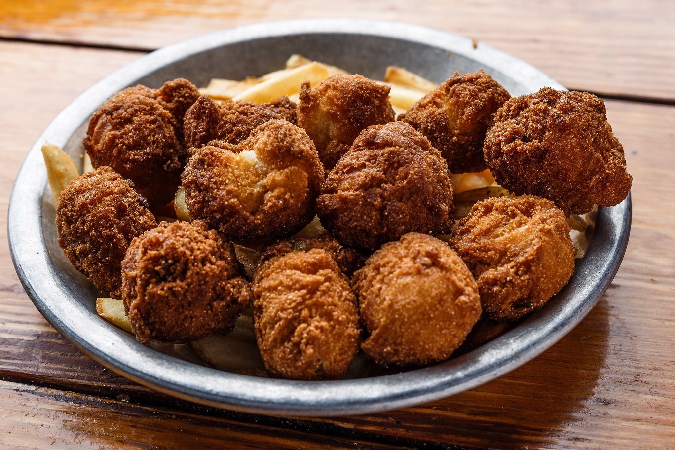 Order Hushpuppy a la Carte food online from Cock of the Walk store, Nashville on bringmethat.com