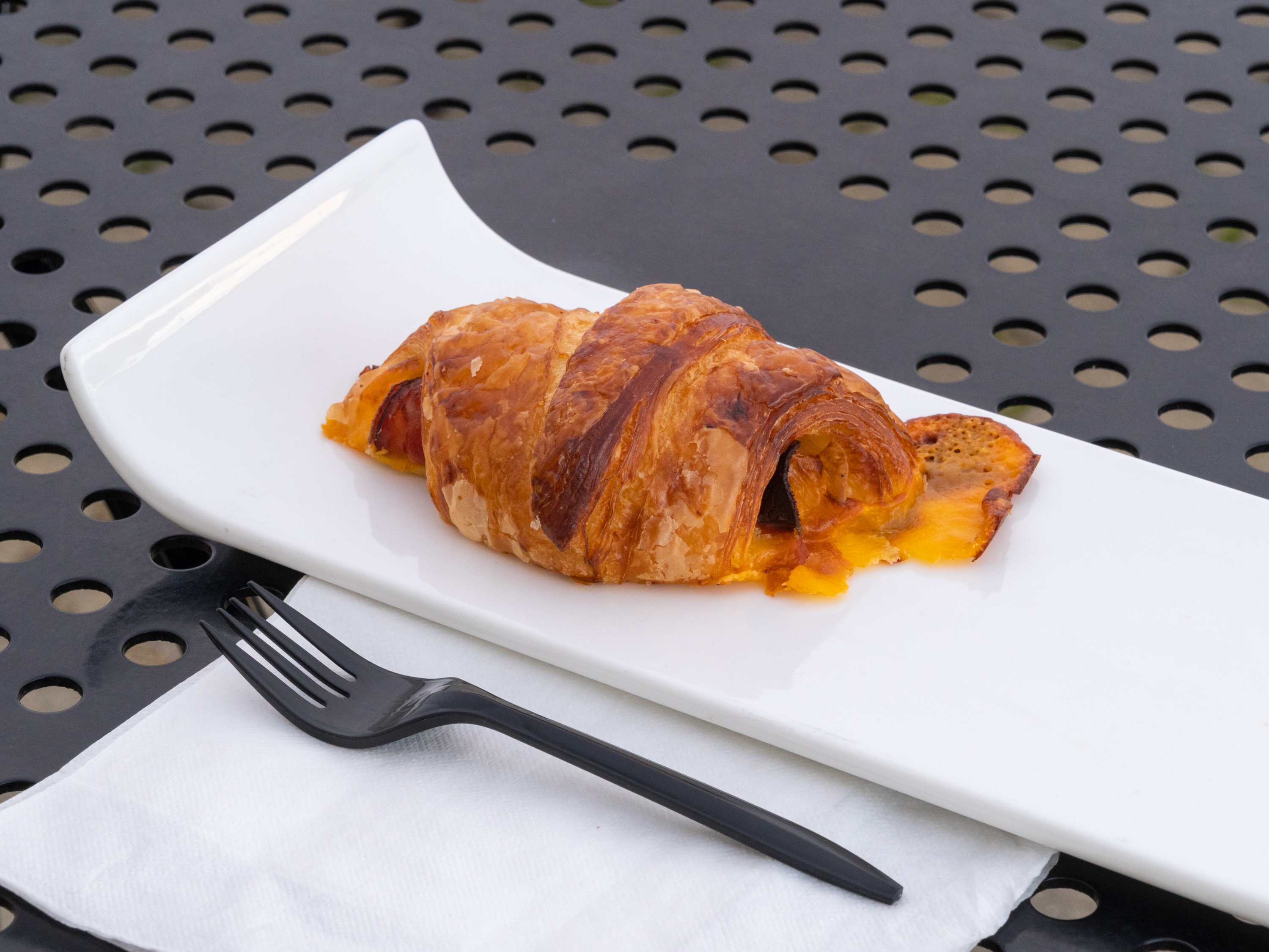 Order Ham and Cheddar Croissant food online from Dore Bakery store, Brentwood on bringmethat.com