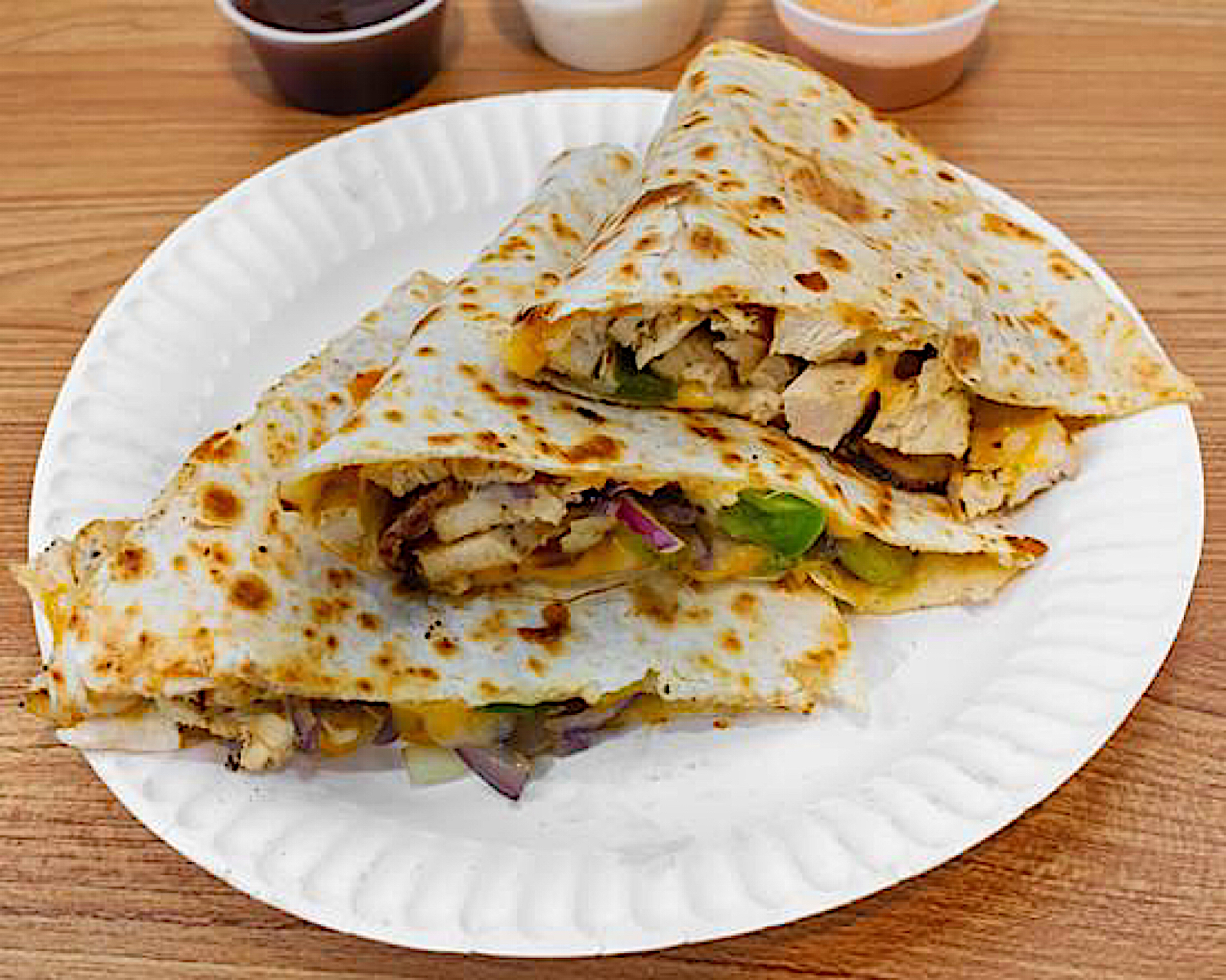 Order 1. Cajun Chicken Quesadilla food online from 5 brothers gourmet deli store, New York on bringmethat.com